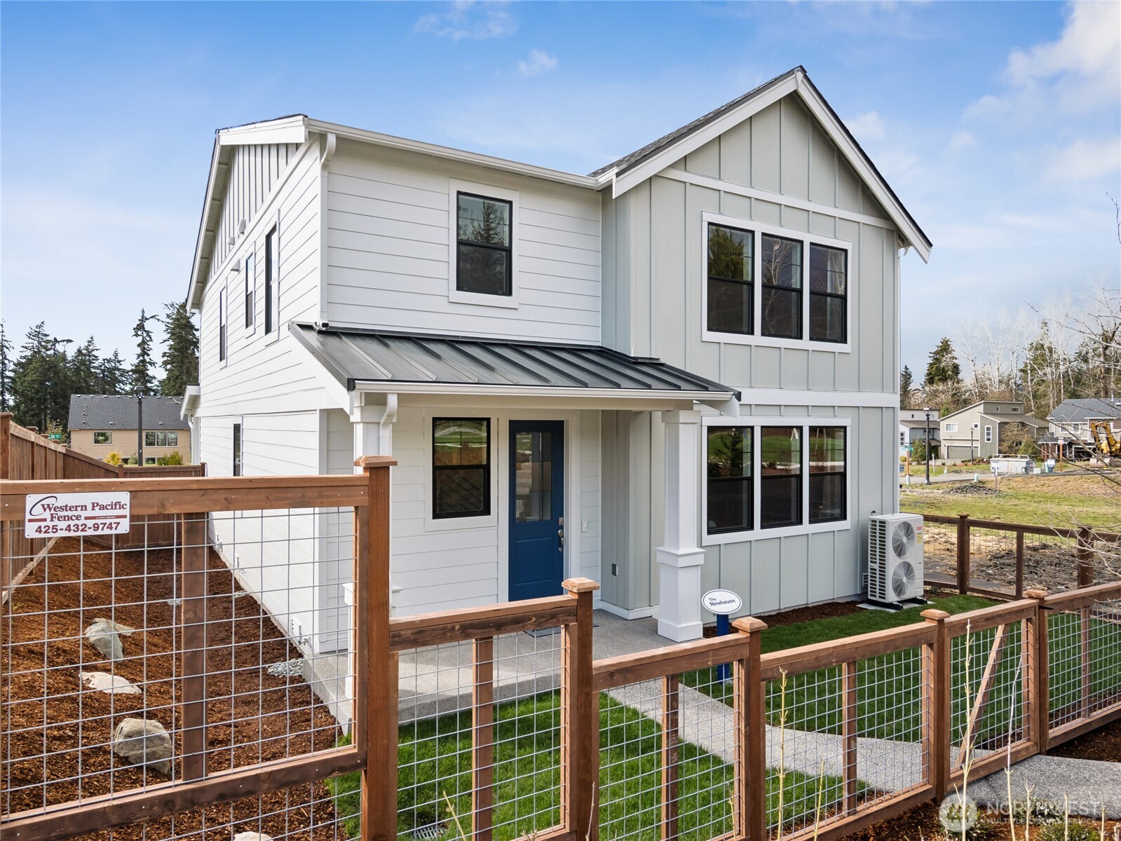 Fully fenced yard with a gate opens to community walking path. Photo is representational. Actual home is under construction and finishes and paint colors may vary. See site agent for details....
