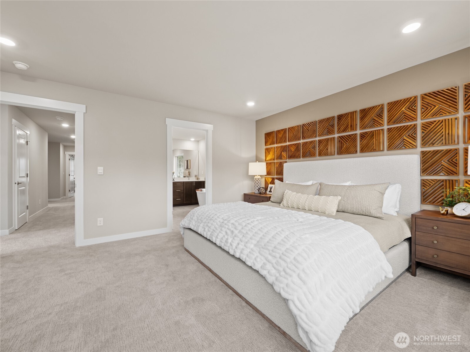 Another view of the primary bedroom. Photo is representational. Actual home is under construction and finishes and paint colors may vary. See site agent for details....