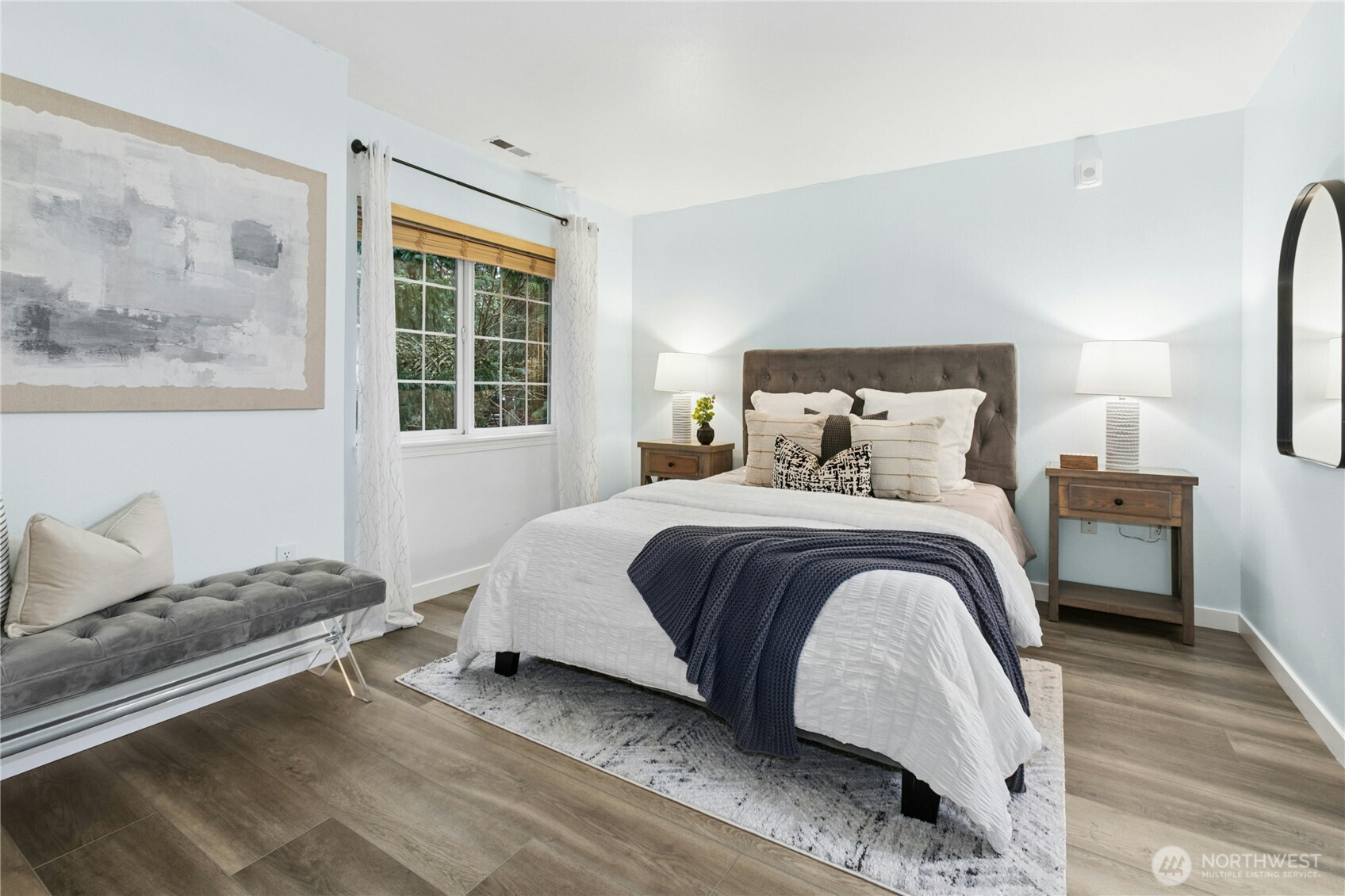 hop across the hall to the second bedroom. Spacious!
