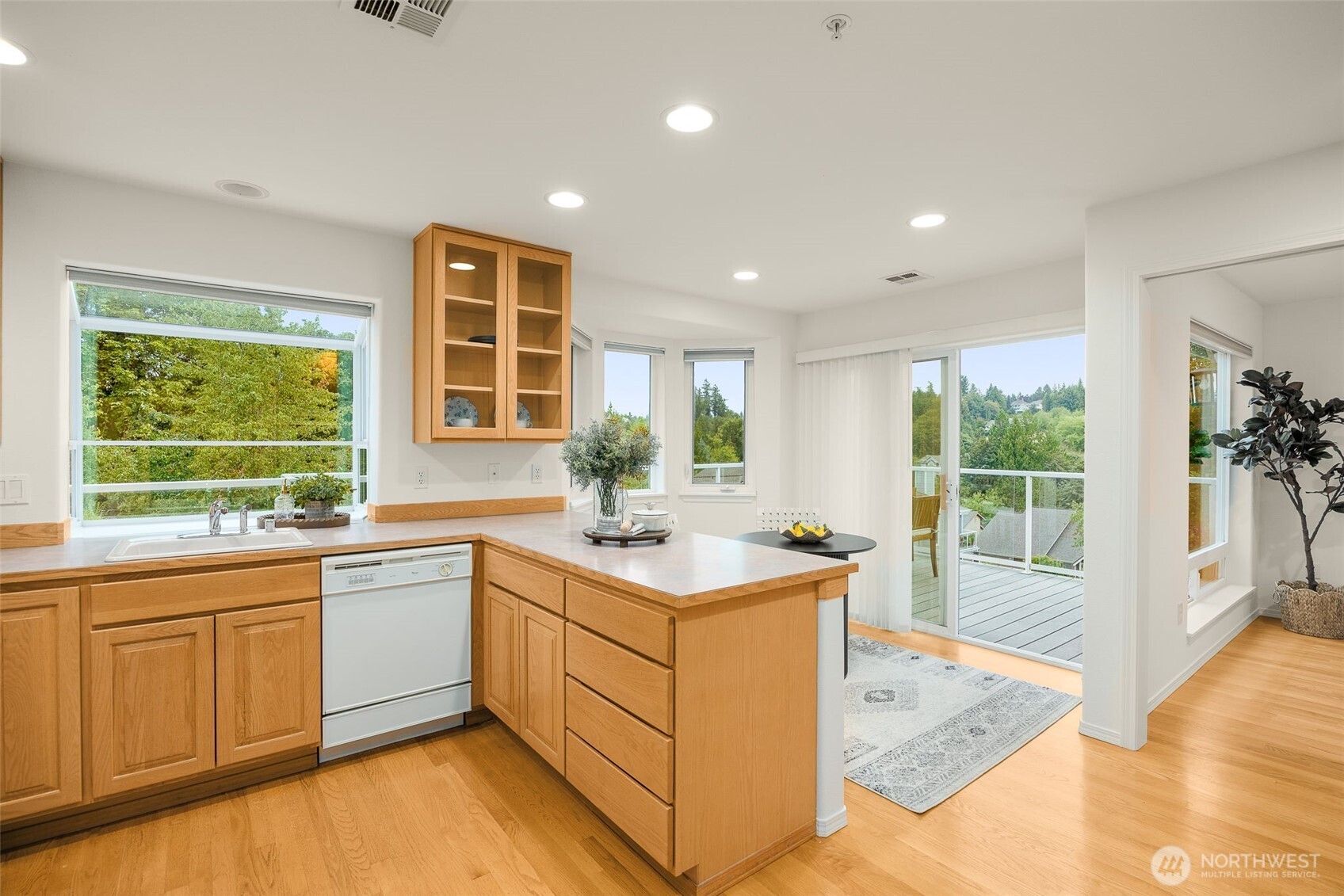 Large kitchen adjacent to the dining room; just a few steps from the deck