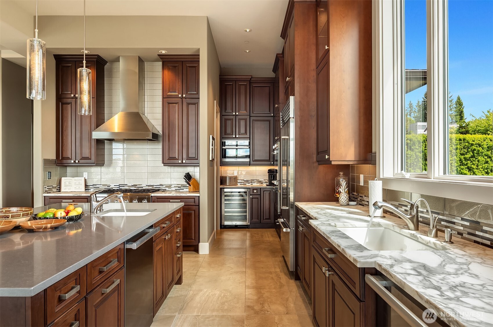 Galley leads to butler pantry and walk in pantry