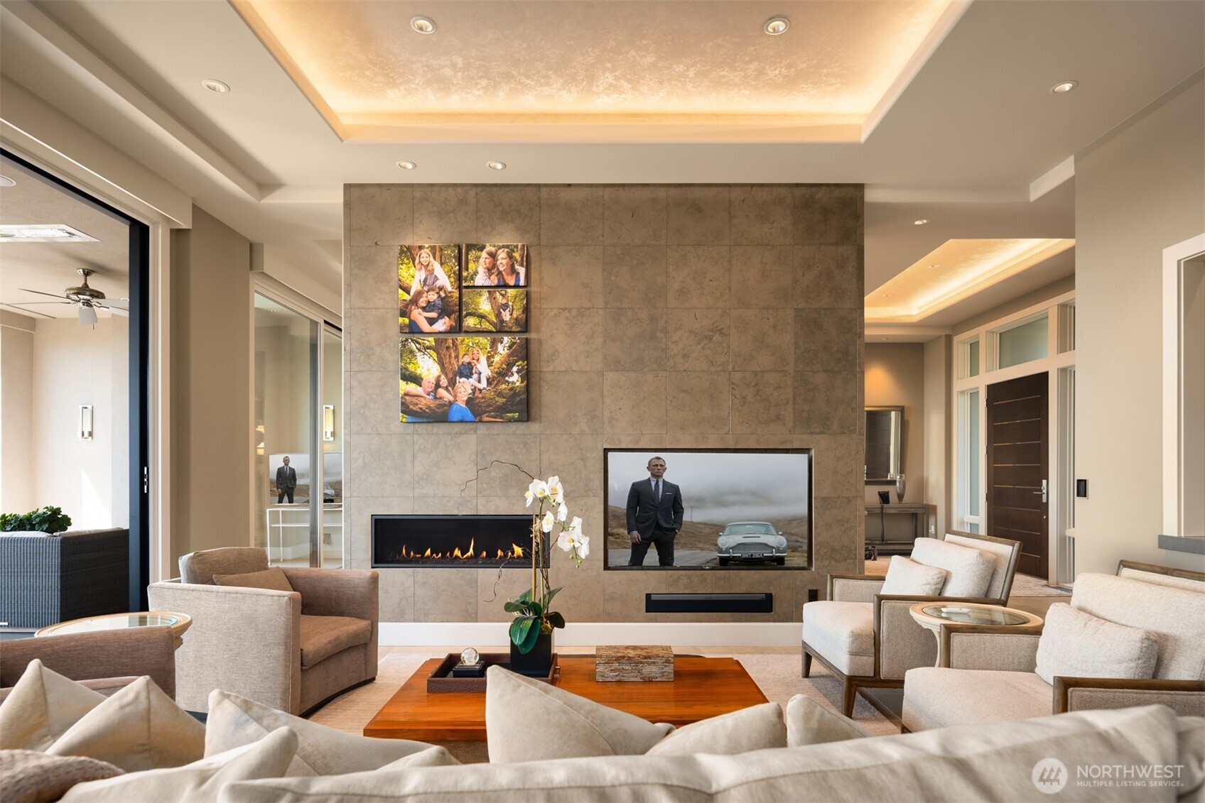 Linear fireplace and TV and art wall