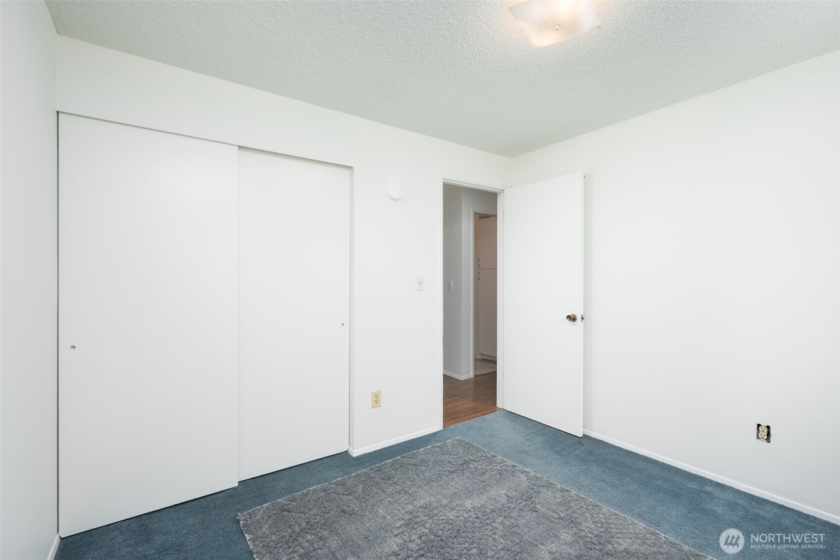 The third and final bedroom sits just off the hallway.