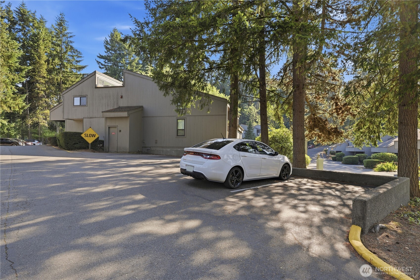 Open lot for extra/visitor parking just steps away.