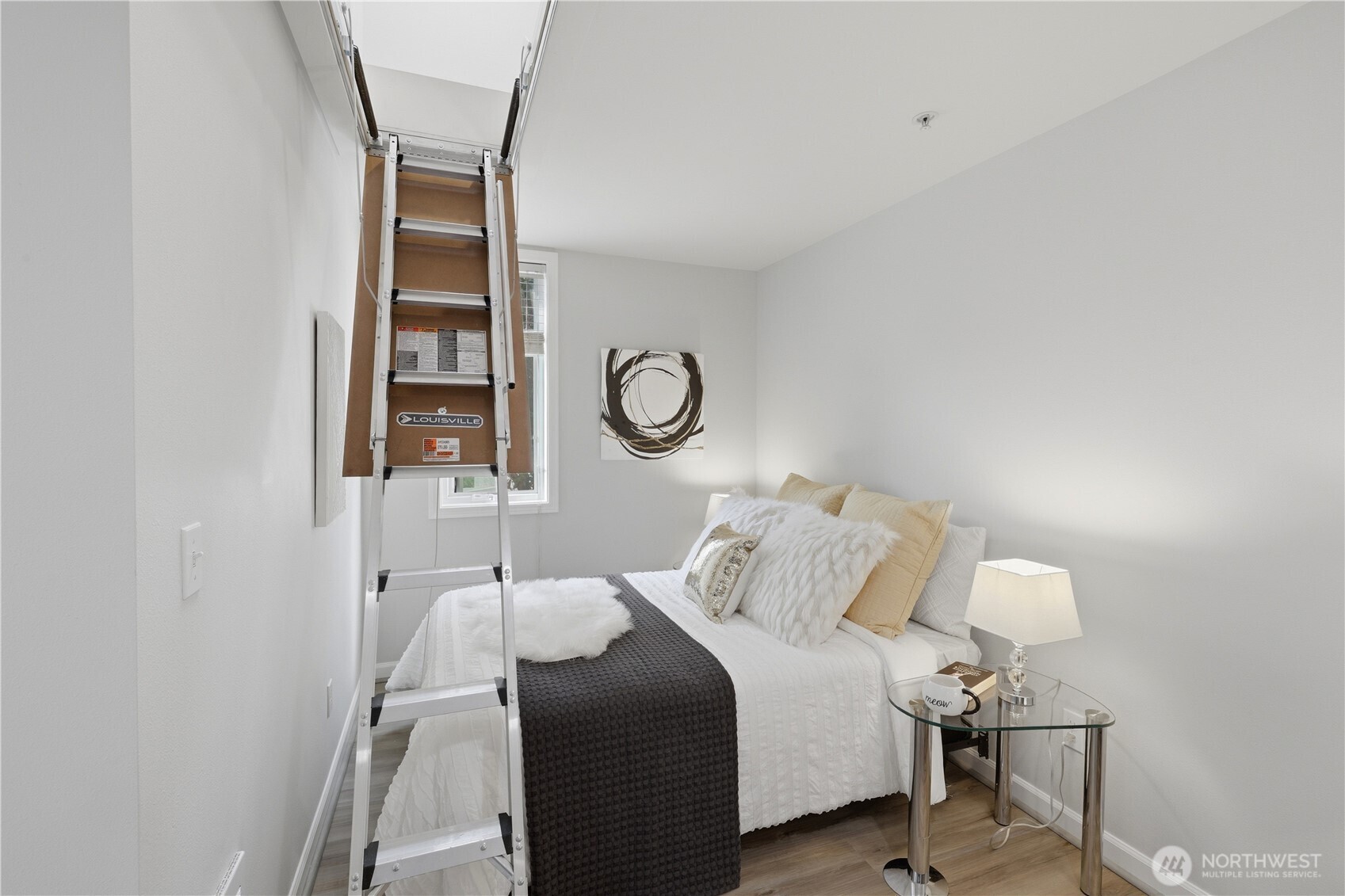 Bedroom alcove is just the right size for a large bed + nightstands