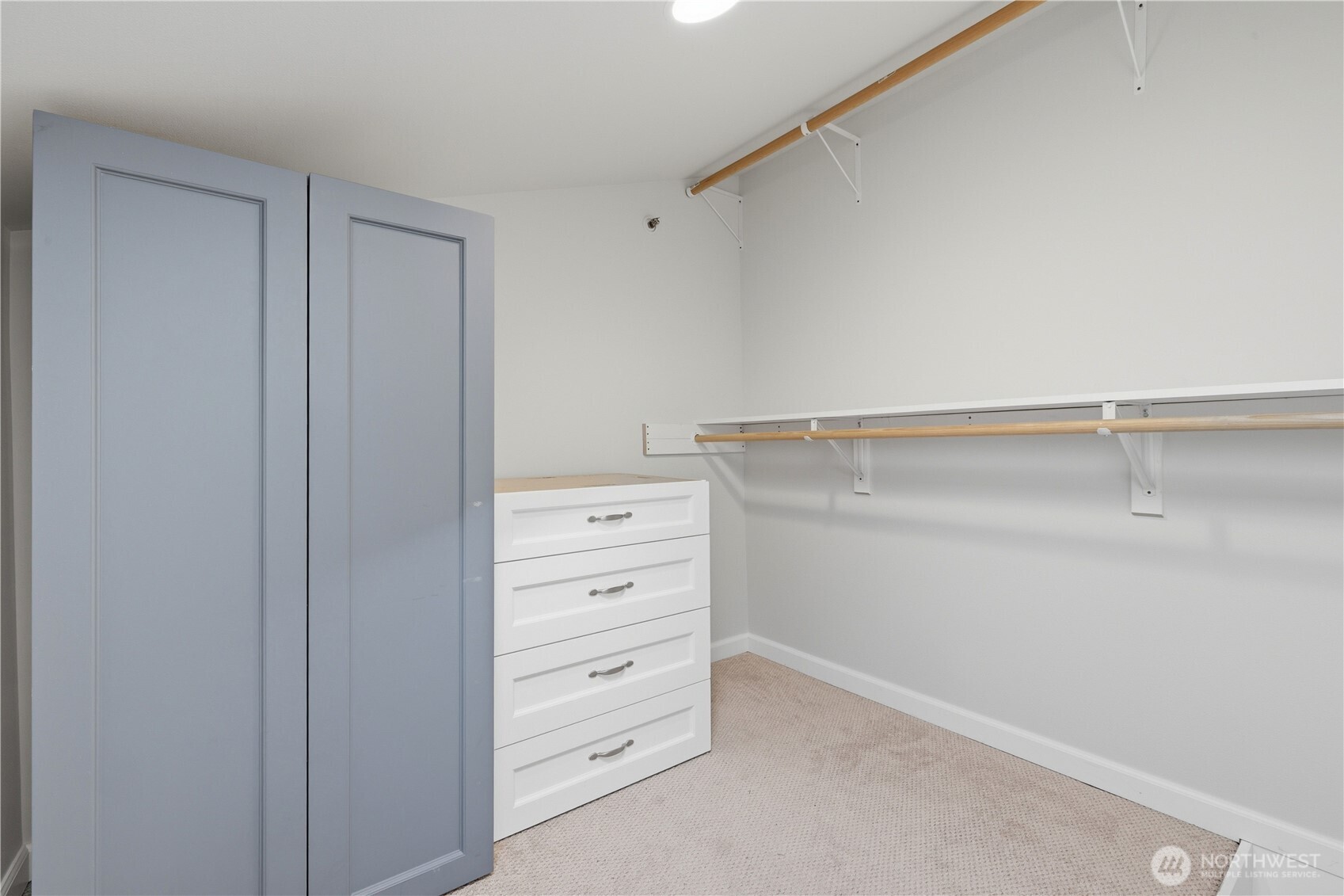Pull downstairs provide access to the upstairs loft. Currently used for closet storage. Would also be a great location for desk/office.