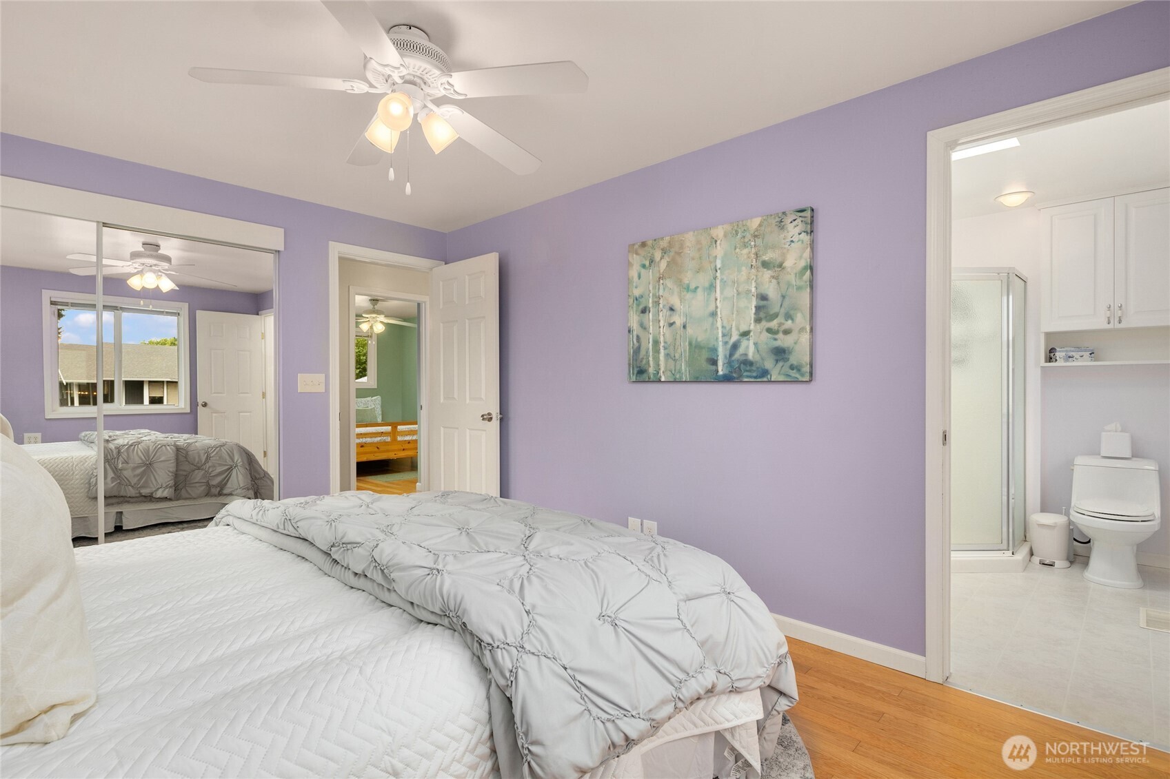 Great light & a remodeled 3/4 en-suite bath are featured in the primary suite.