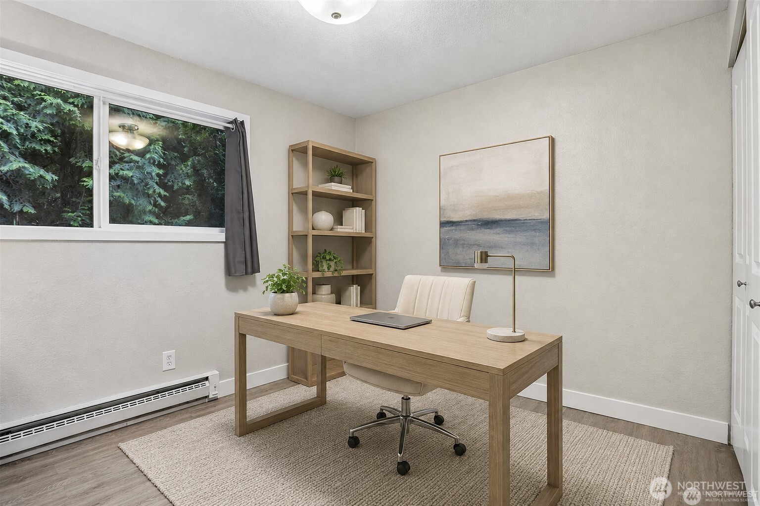 Second bedroom virtually staged and shown as an office. Could be a great nursery, bedroom, guest suite or an office.