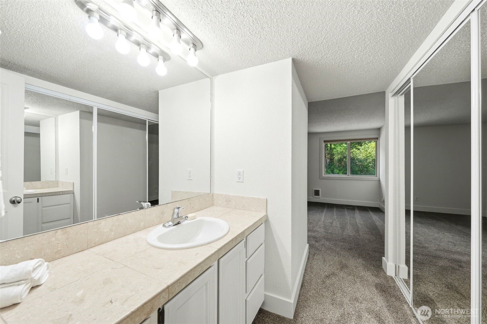 Primary Bath with long closet wall