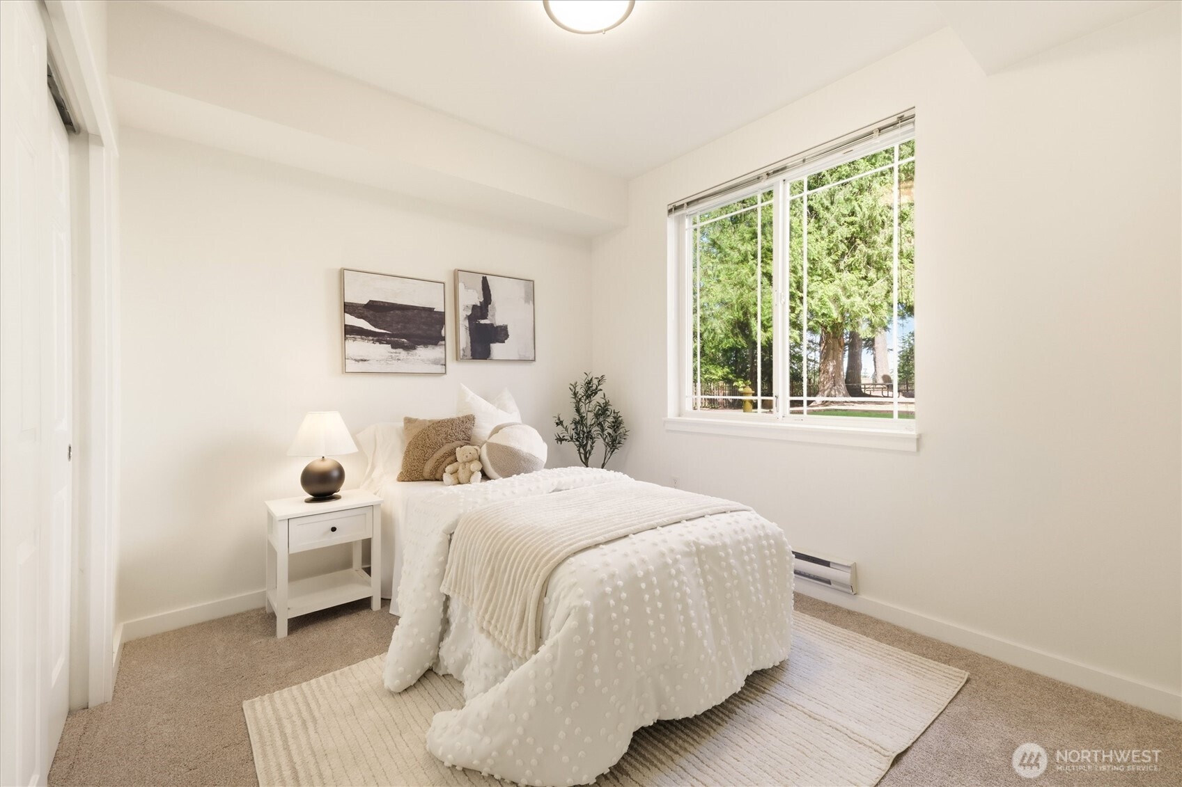 Generously-sized guest bedroom.