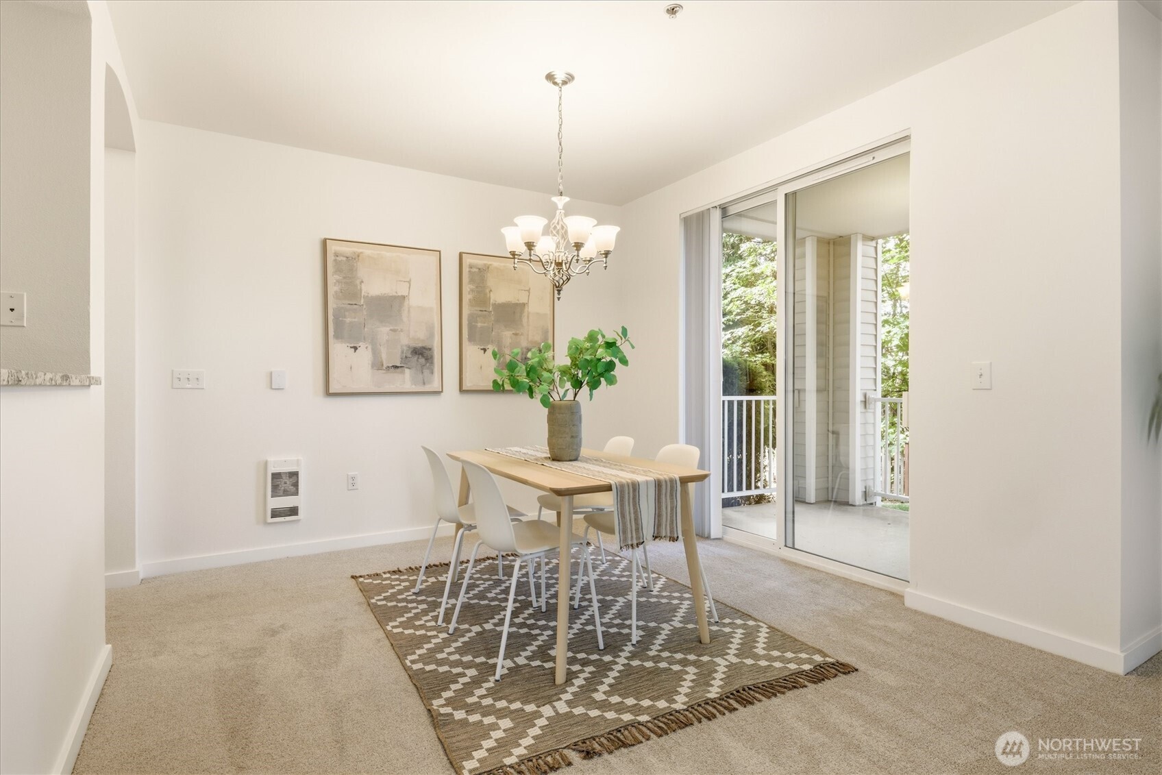 Dedicated dining space that leads to the balcony.