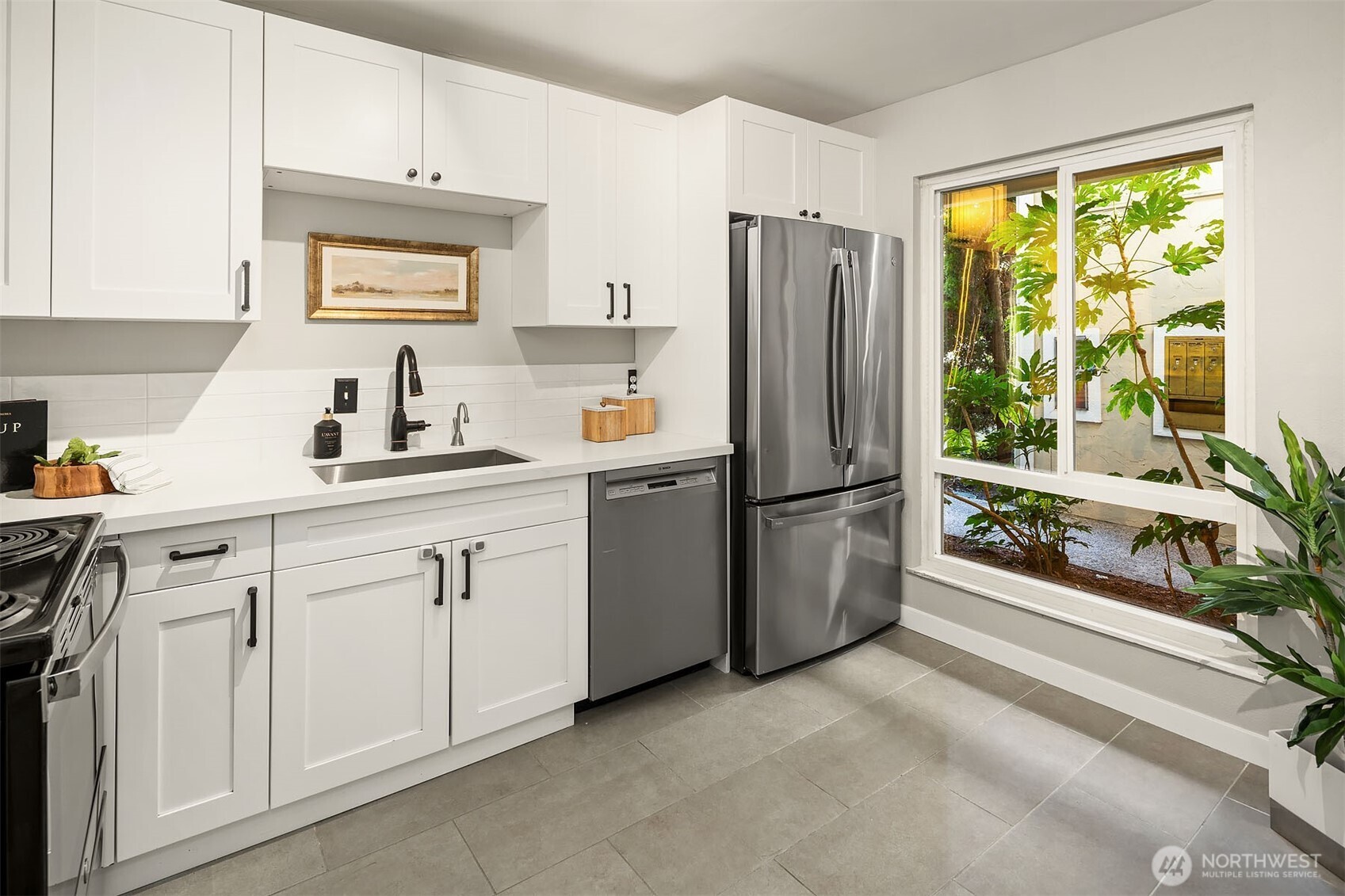 Ample space for rolling island and oversized window to bring in natural light!