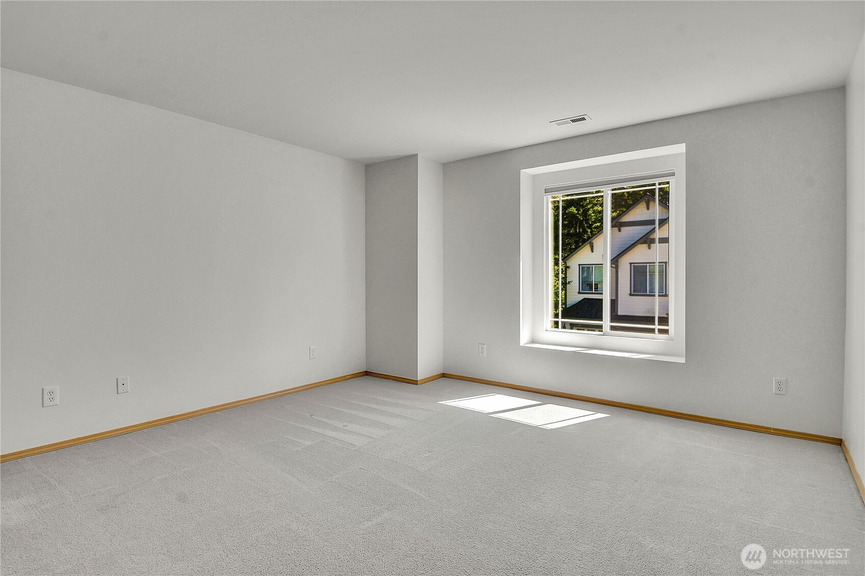 Middle bedroom closet. Bi-fold doors, built-in closet organizers with drawers.