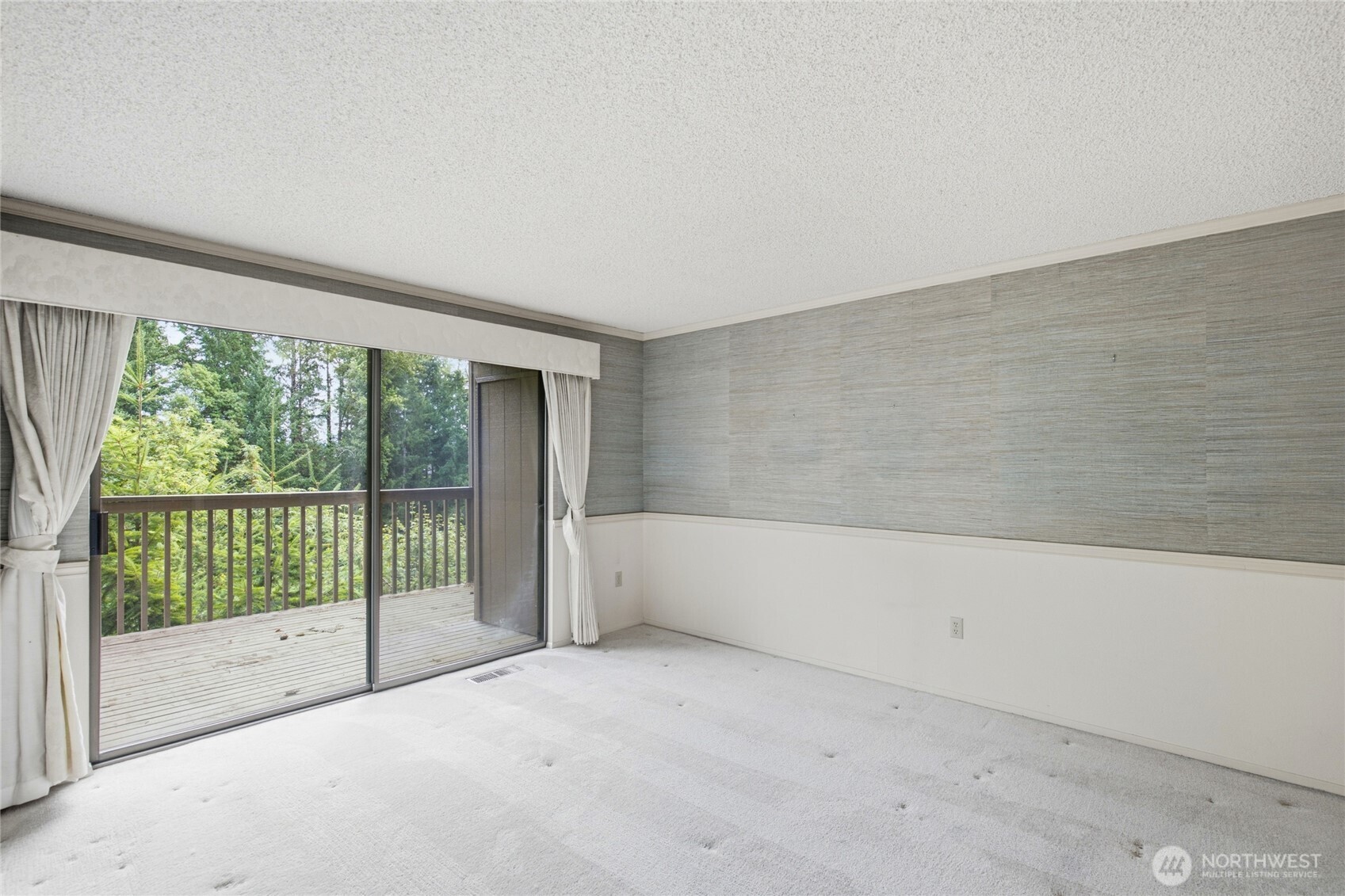 Second bedroom opens to its own private deck.