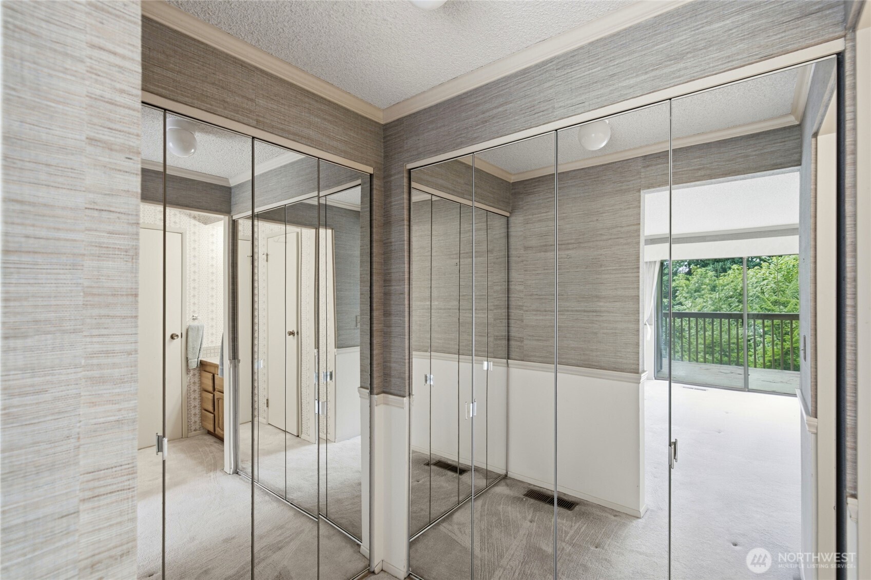 Bath with extended vanity and natural light.