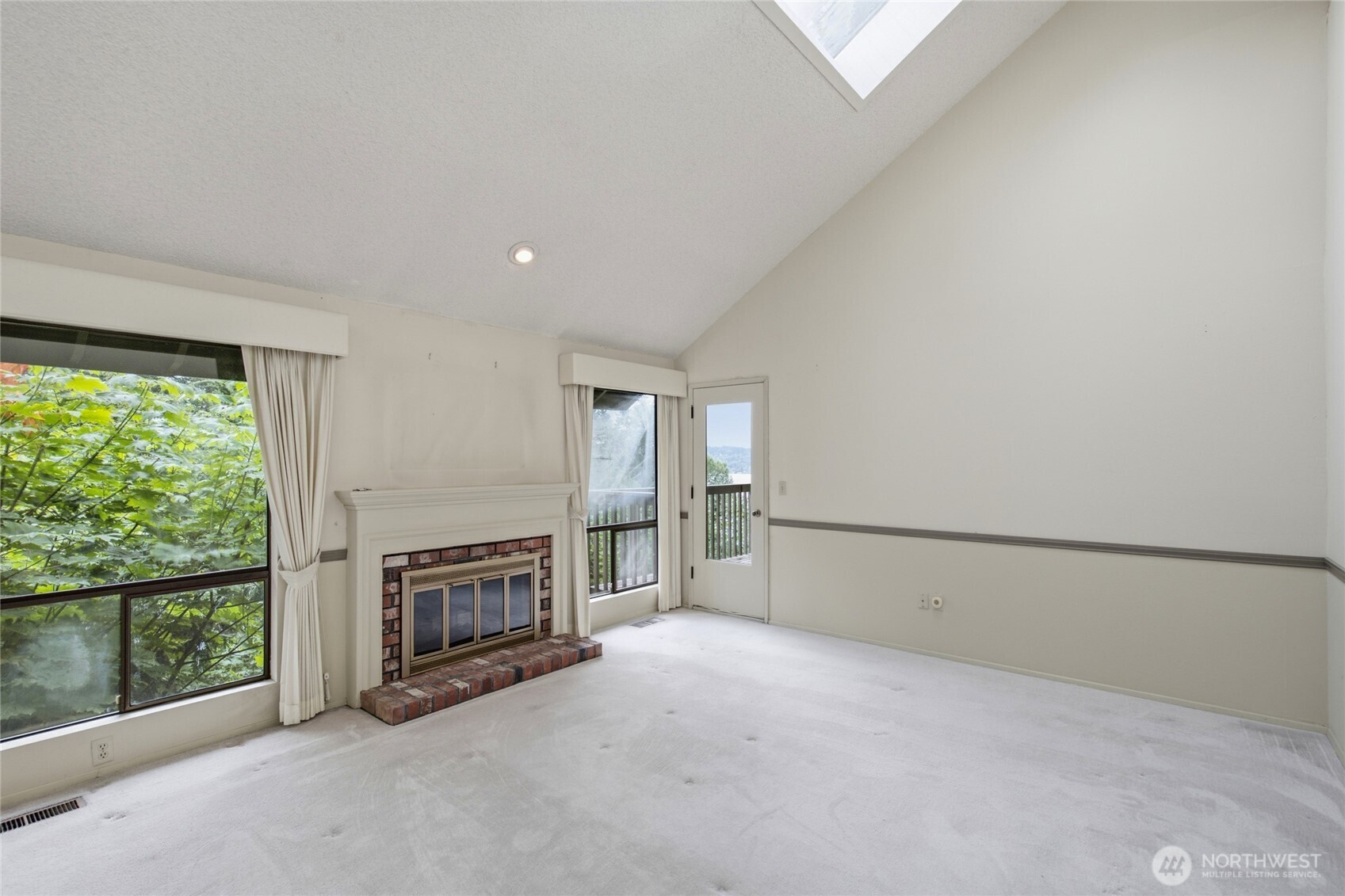 Vaulted Ceilings open to the level below.