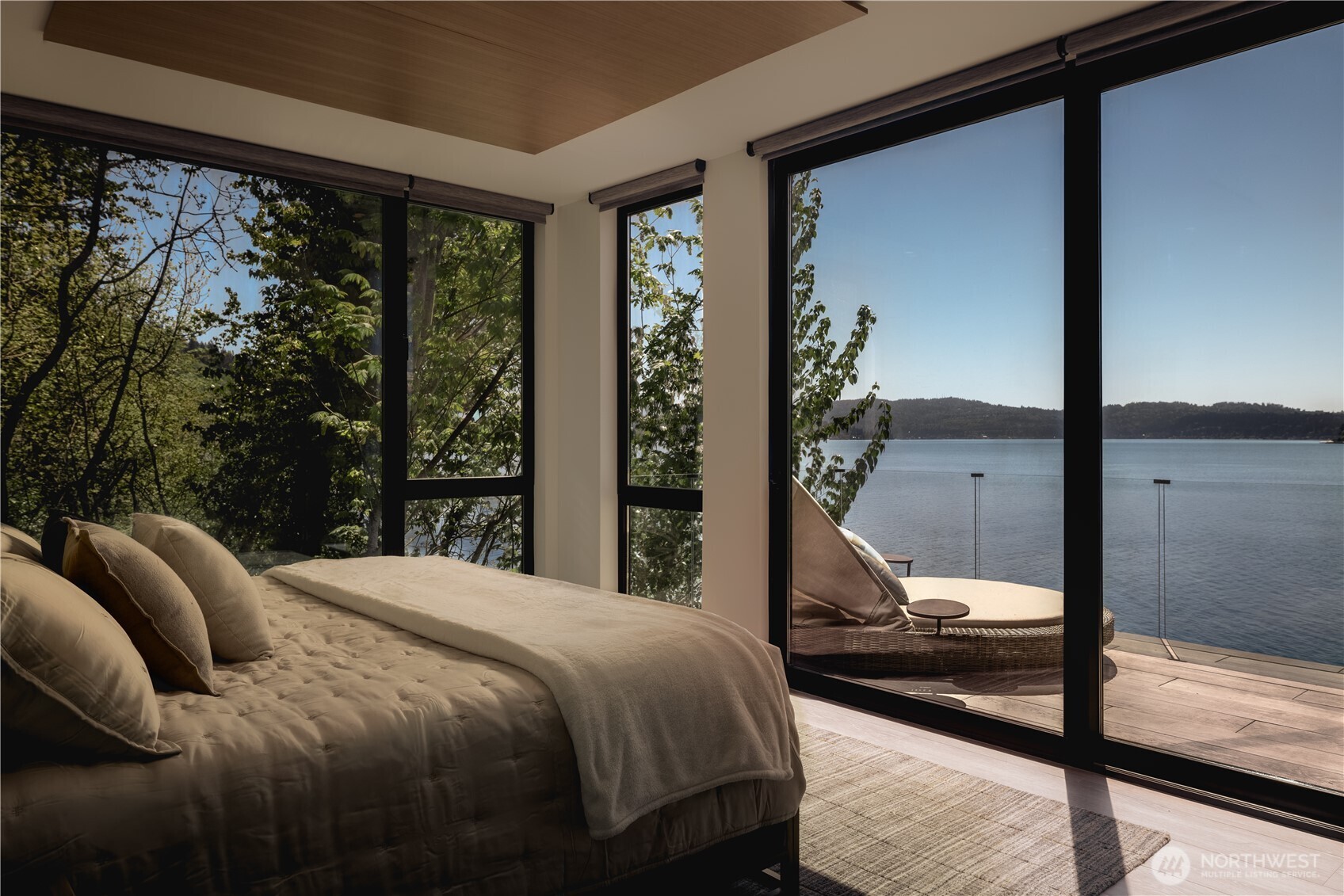 The primary suite brings light, material, and outlook into quiet alignment.