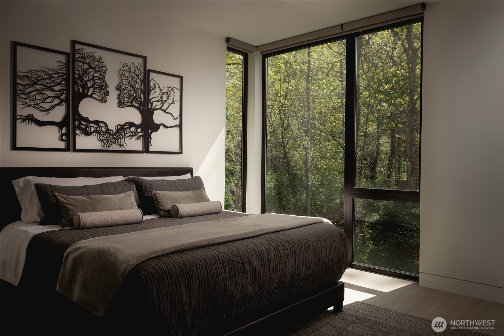 The guest suite is framed by trees, creating a natural sense of privacy.