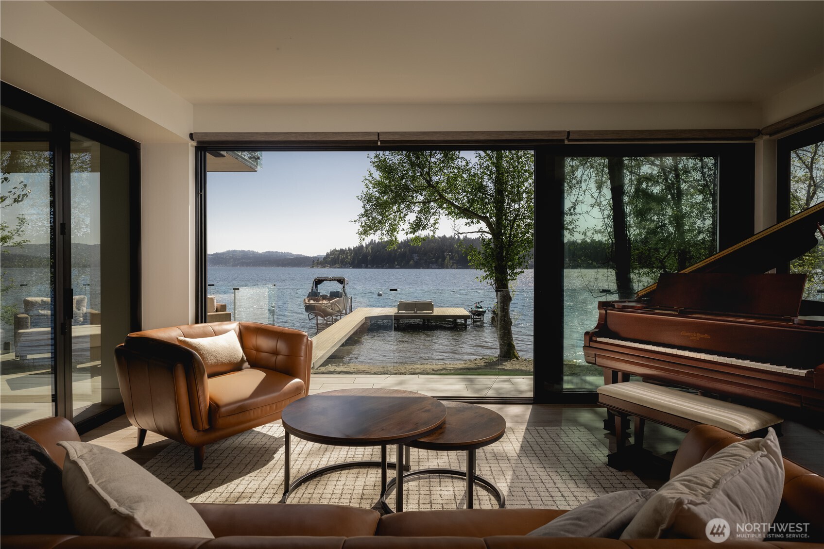 The connection to the water feels immediate, as architecture extends beyond its walls.