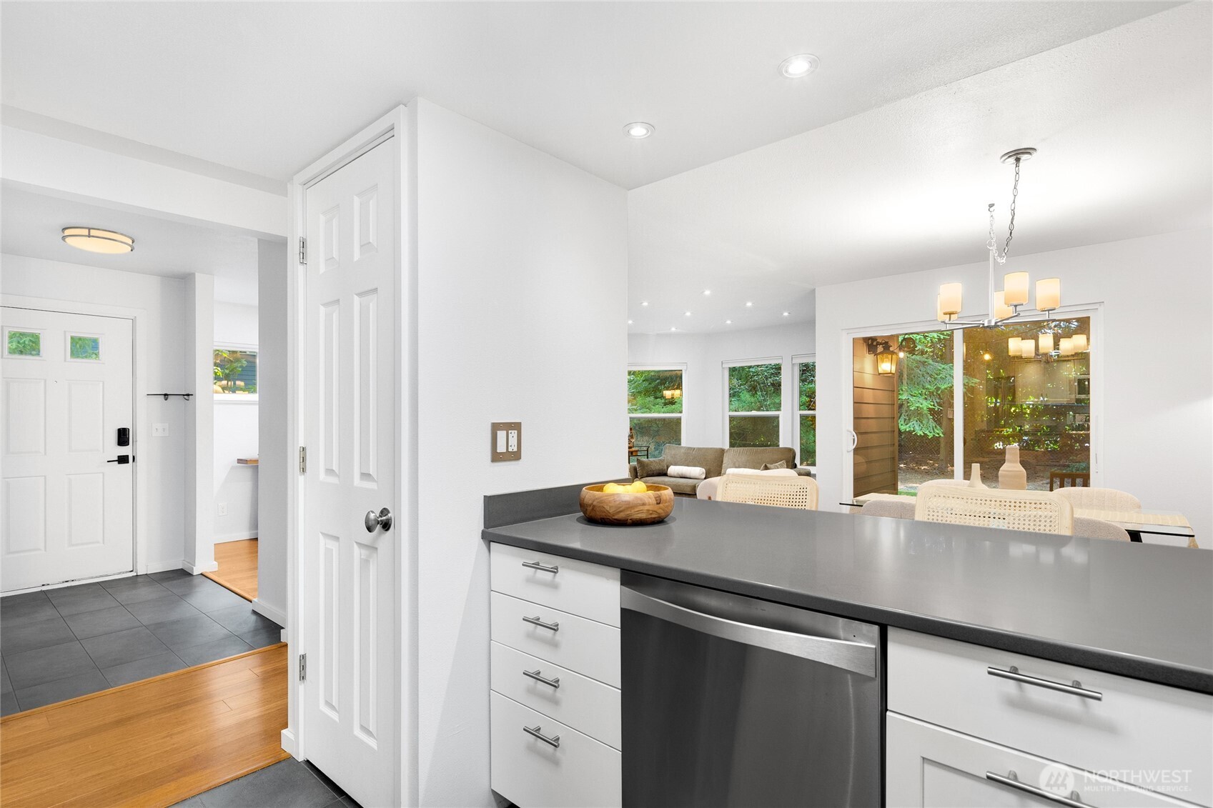 Separate deep pantry for kitchen storage.