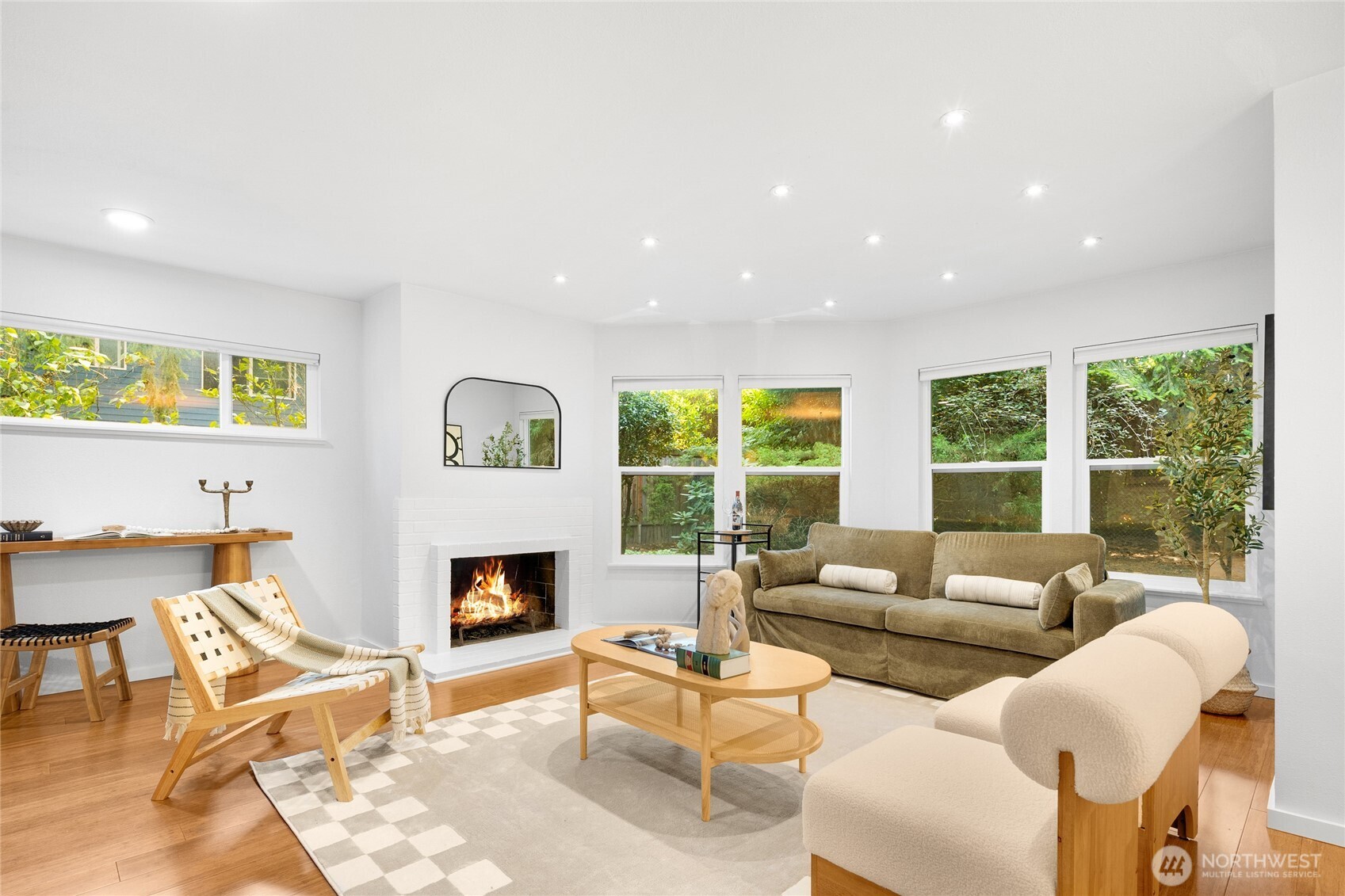 The living room is large enough for two separate living spaces, a work from home setup, and so much more!