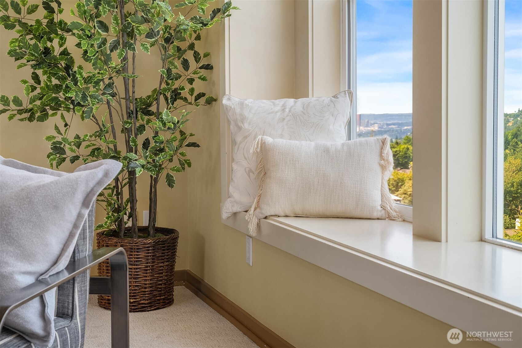 Enjoy sweeping territorial views with glimpses of Lake Washington and the Bellevue skyline from thoughtfully placed picture windows throughout the home. Deep window ledges create the perfect place to relax with a morning coffee, a favorite book, or simply take in the ever-changing scenery.