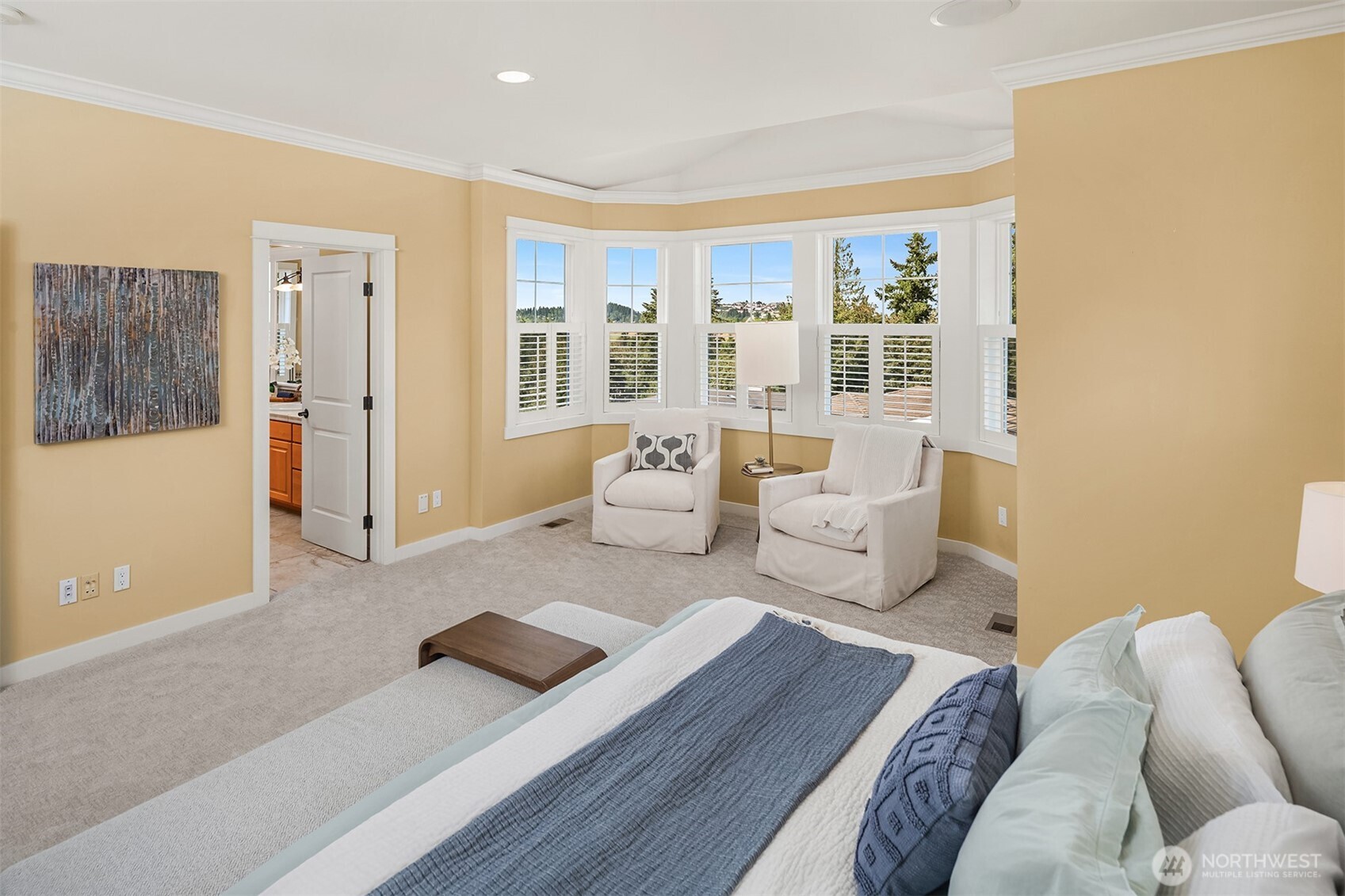 Generous in scale and thoughtfully designed, the primary suite feels more like a private sanctuary than a bedroom.