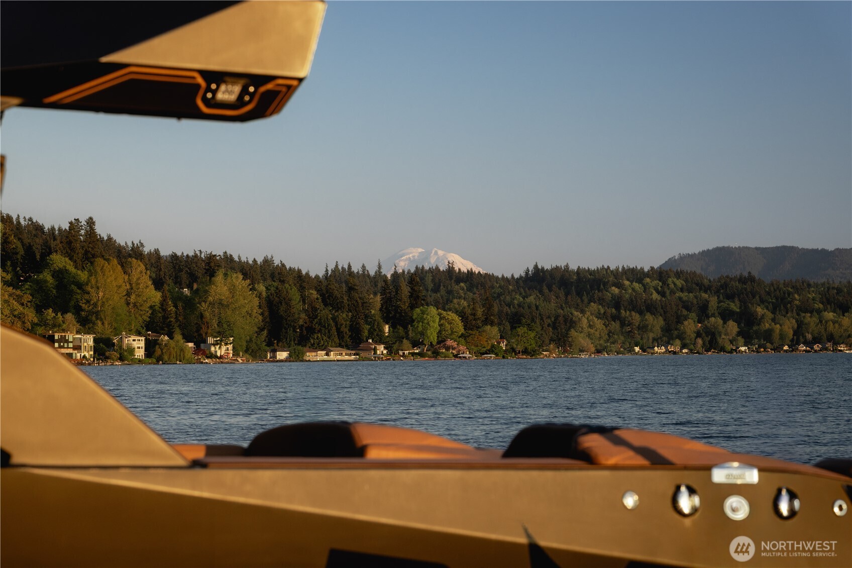 From the dock, Mt. Rainier rises beyond the shoreline on clear days.