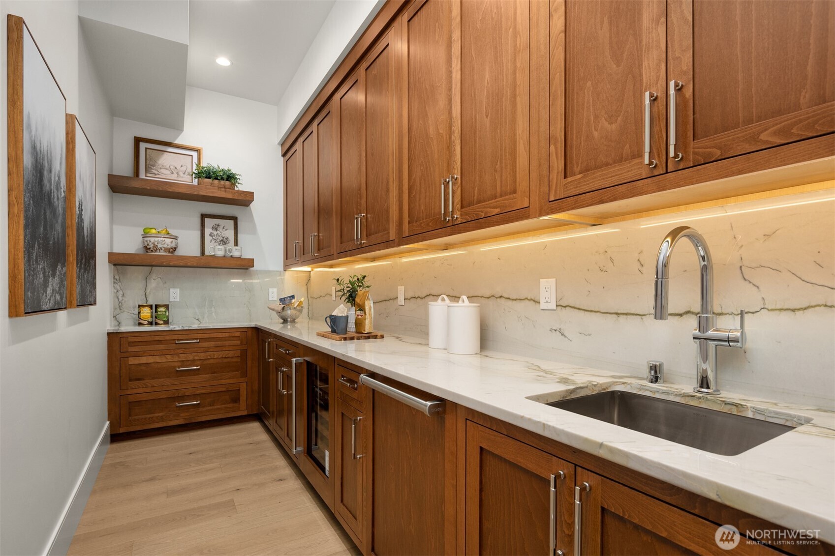 A butler's pantry provides the necessary space and grace for those special occasions, standing ready when celebration calls.