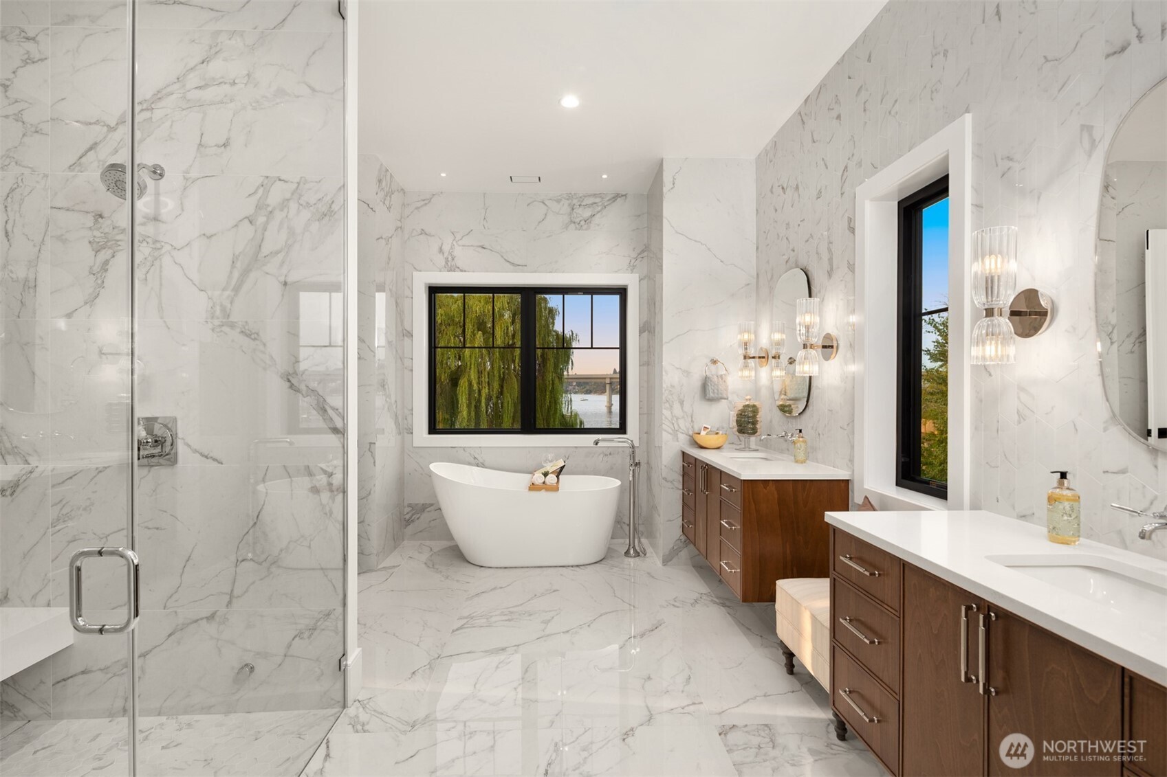 A spa-inspired primary bath sets the stage for peaceful rest and deep relaxation, where every moment invites quiet surrender.