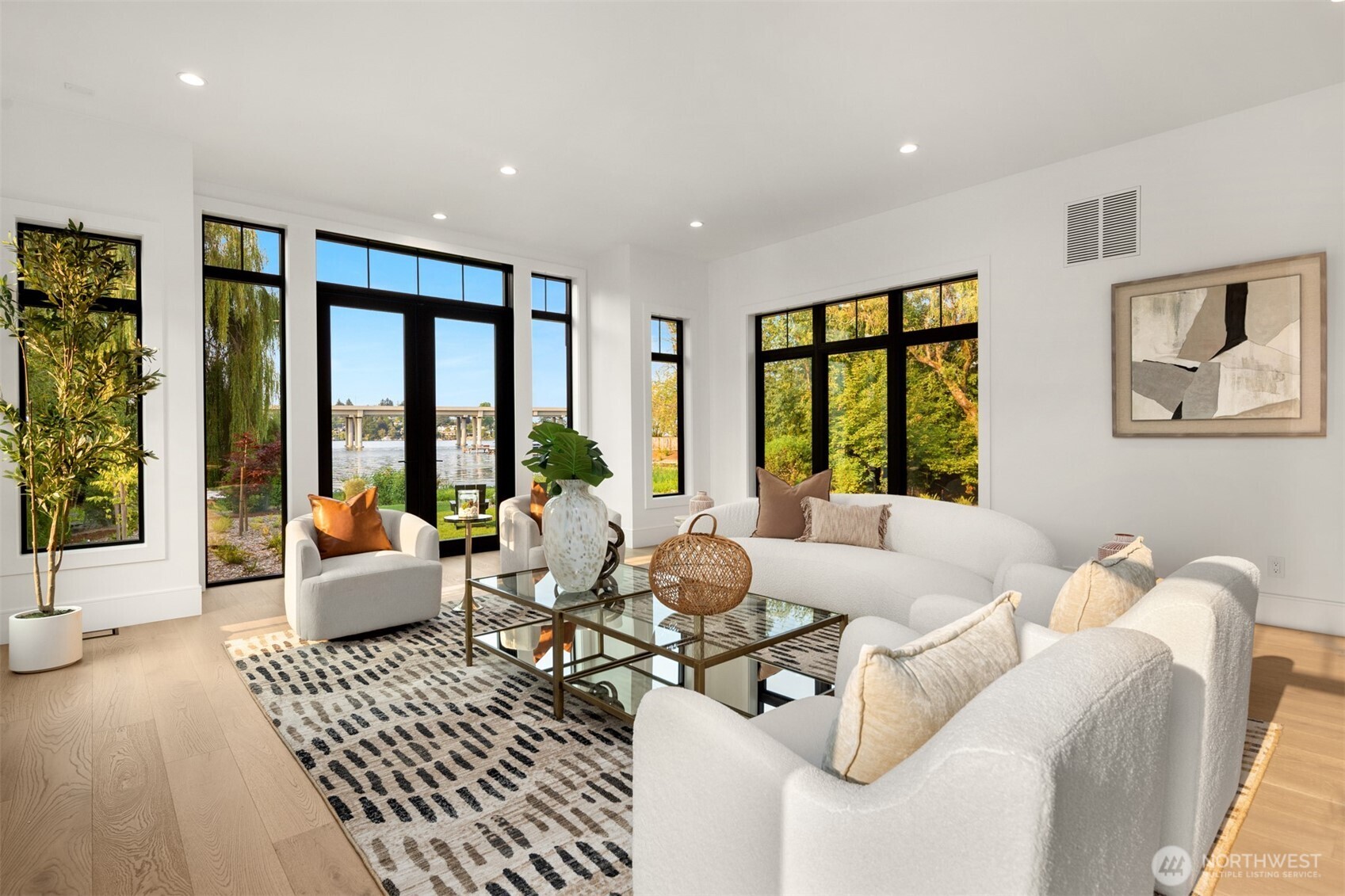 The living room space is open and airy, yet it commands its own quiet sense of presence and proportion.