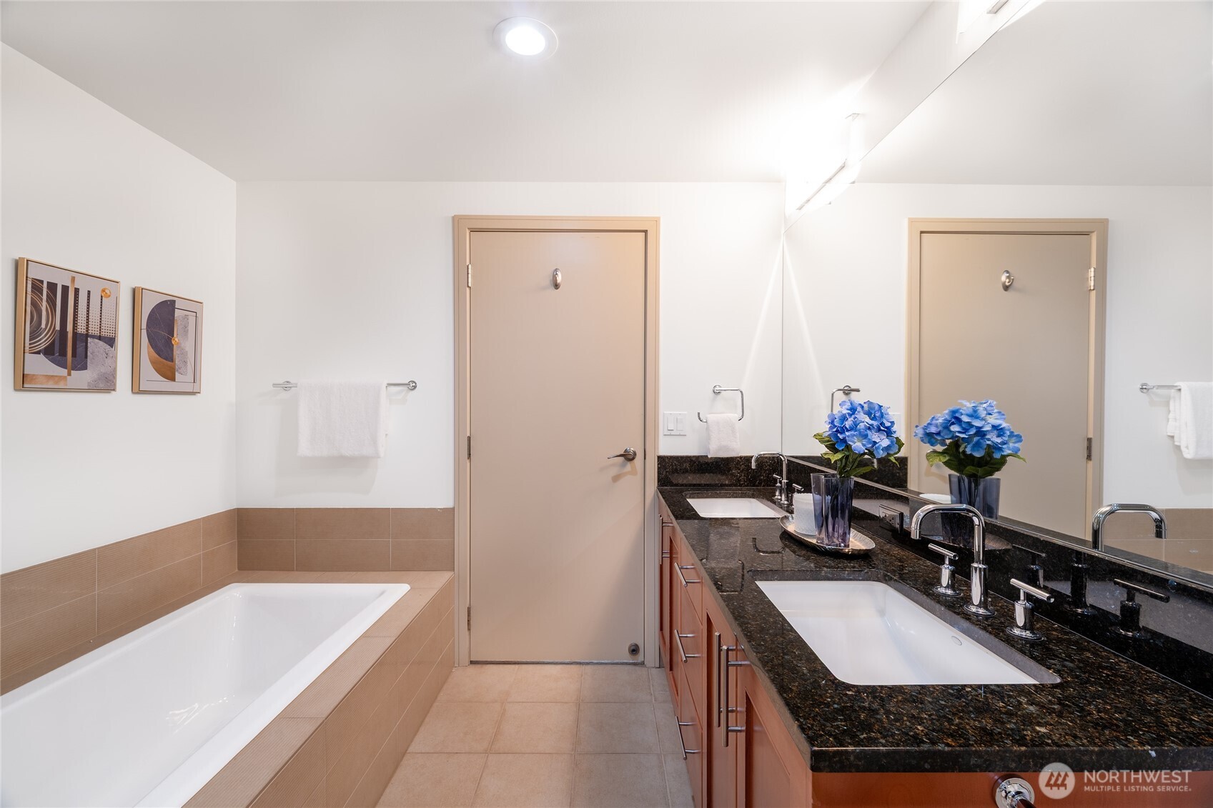 A full bath and dual vanities