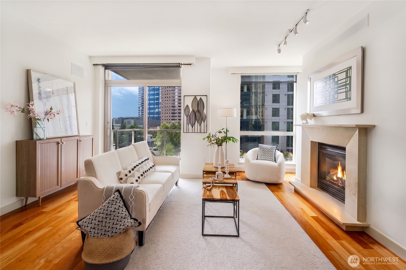 Bright and inviting living space featuring floor-to-ceiling windows