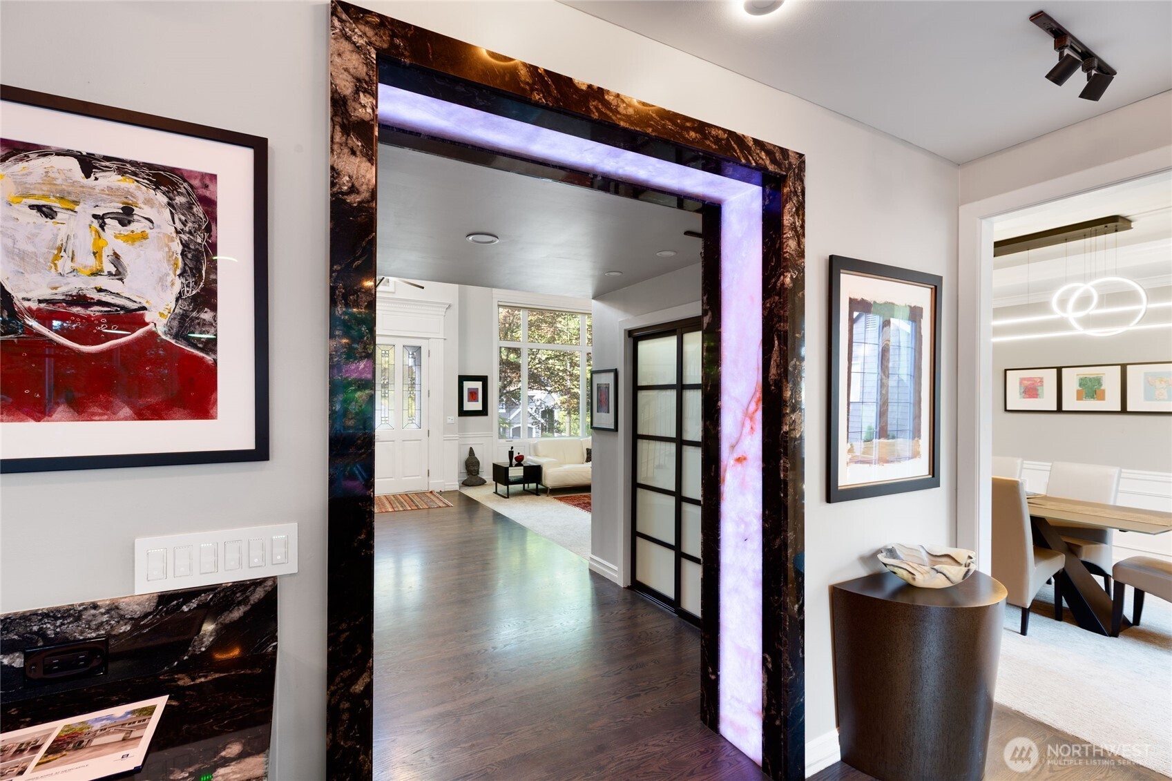 Custom finishes and designer details throughout, including statement lighting and millwork.