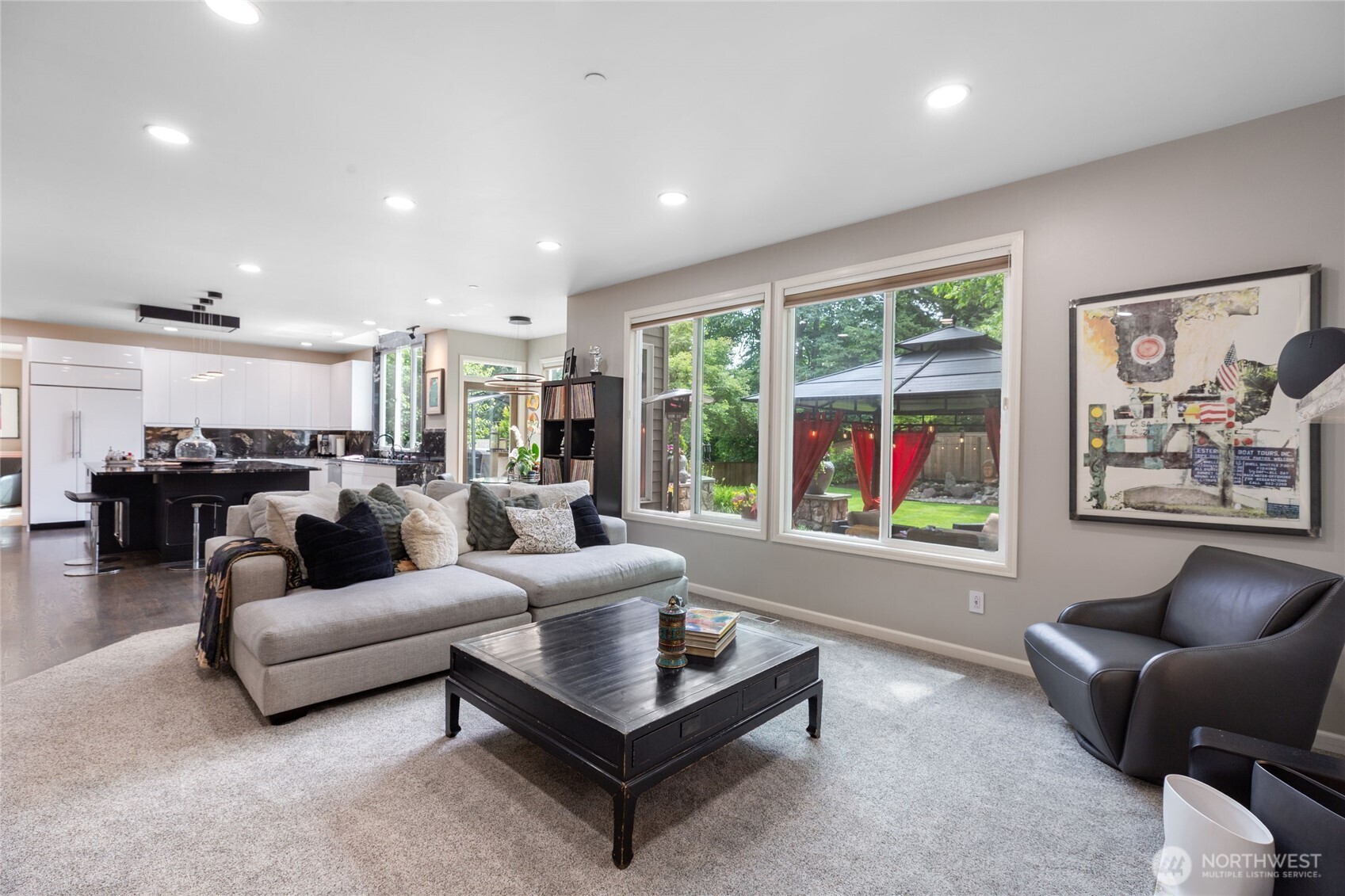 Open-concept layout seamlessly connects kitchen, dining, and living areas—ideal for modern living and entertaining.