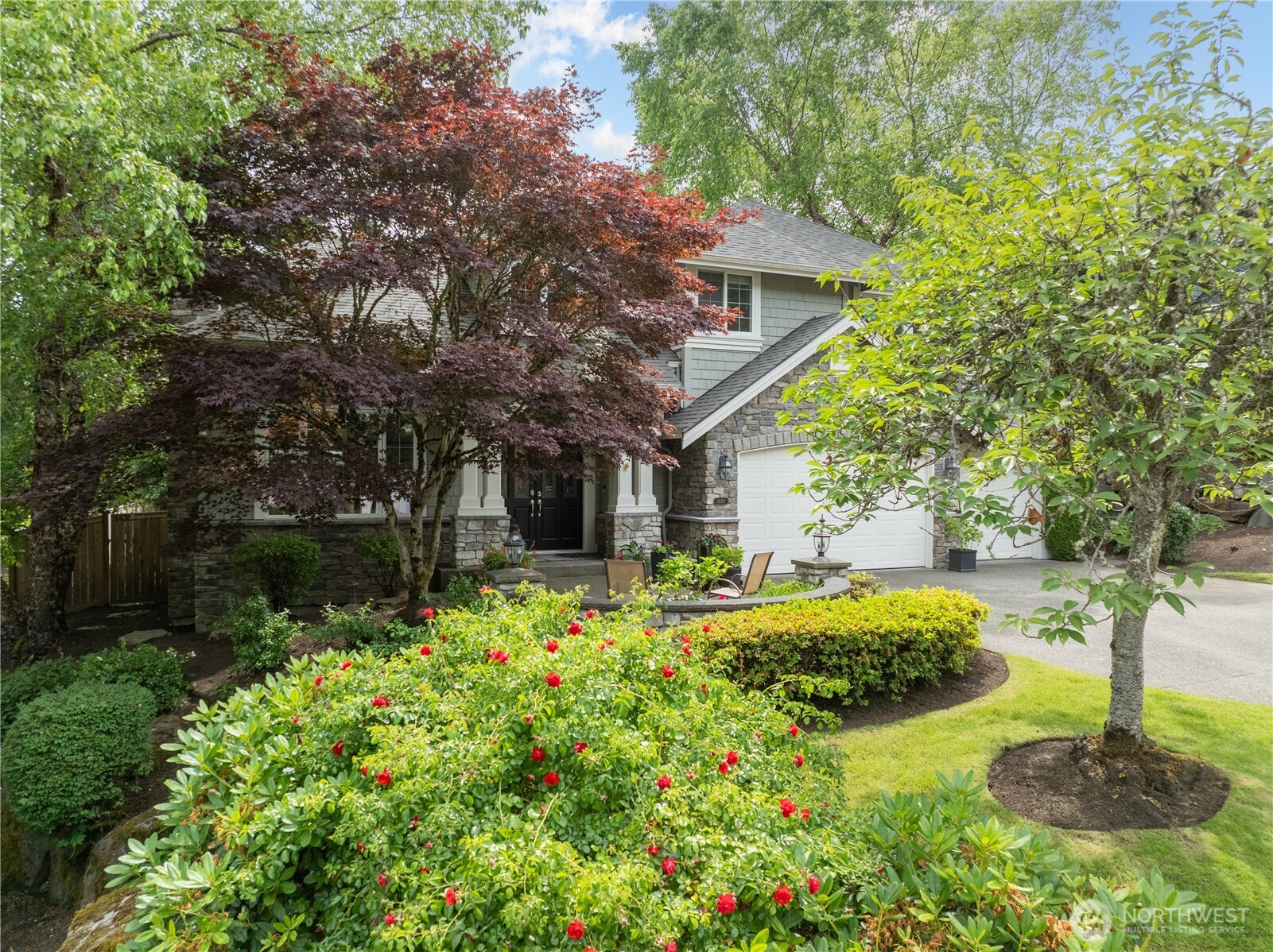 Set amidst lush, mature landscaping in The Highlands at Newcastle, this inviting home offers picturesque surroundings with easy access to Cougar Mountain trails.