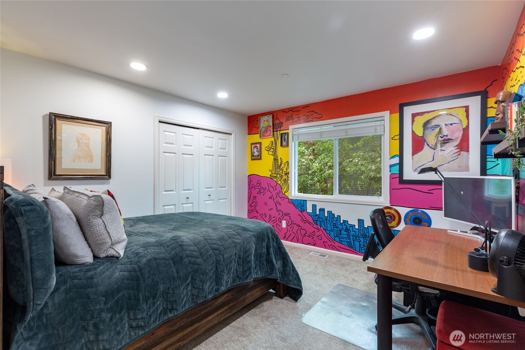 Bedroom #3 is  well lit with clean, modern finishes.