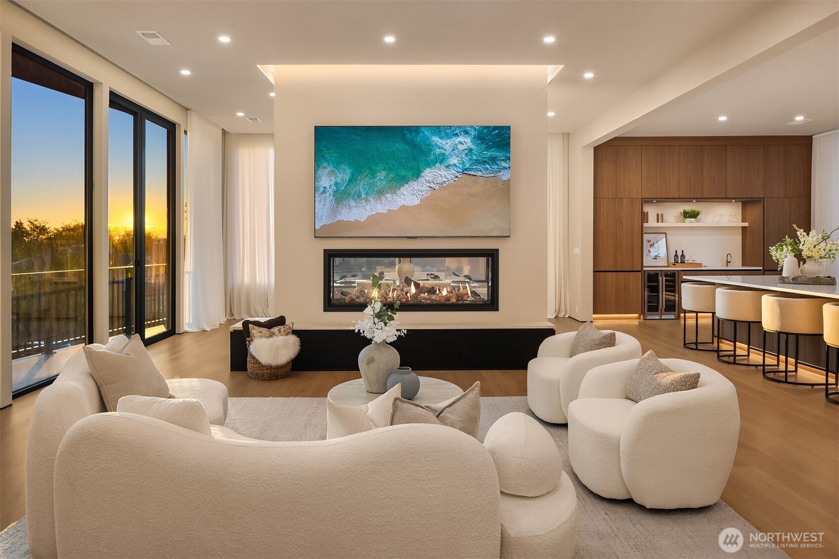 Incredible main floor living space, open with tons of windows + natural light