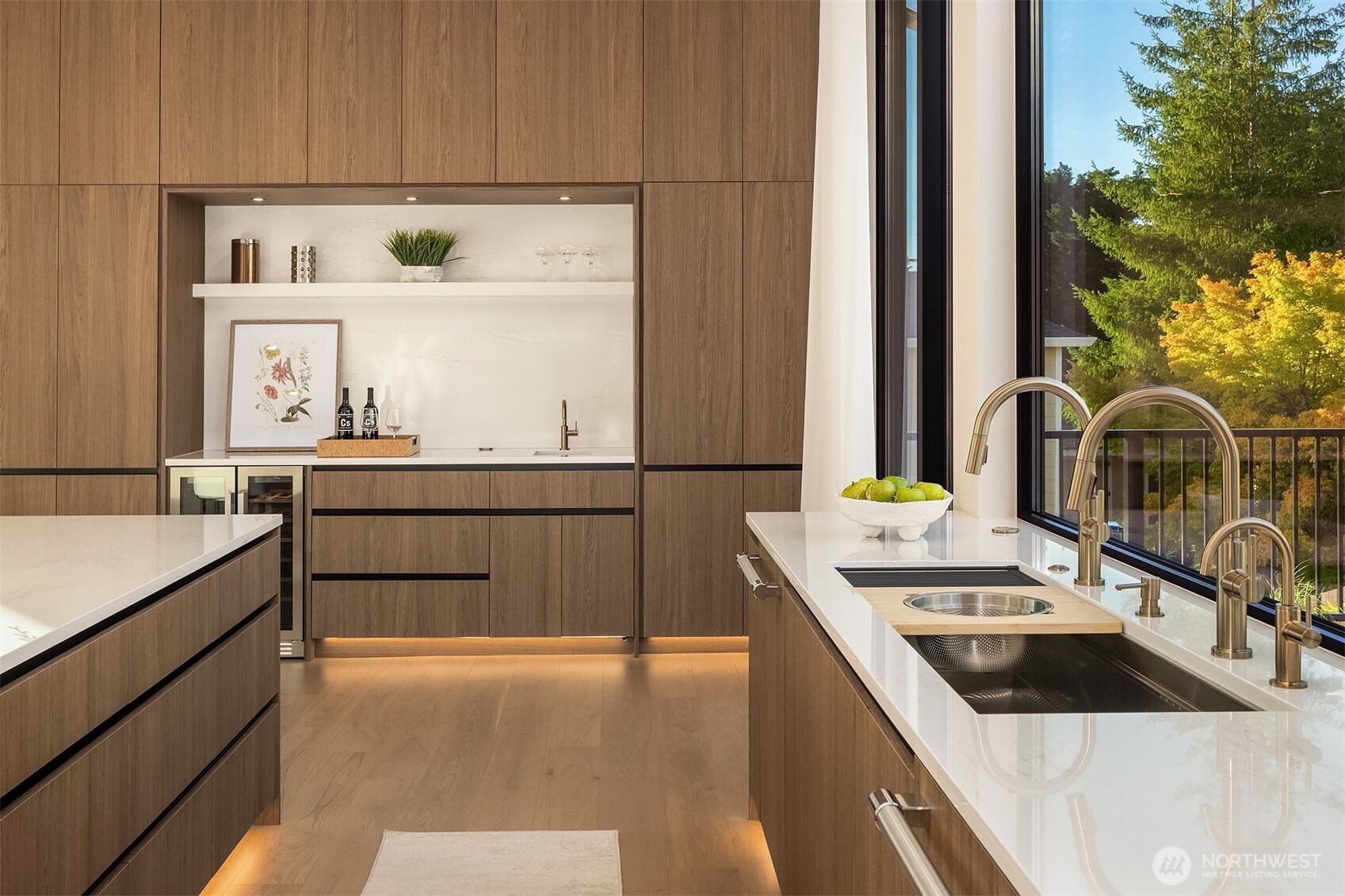 Coffee and/or wine bar! Featuring an additional sink + beverage fridge