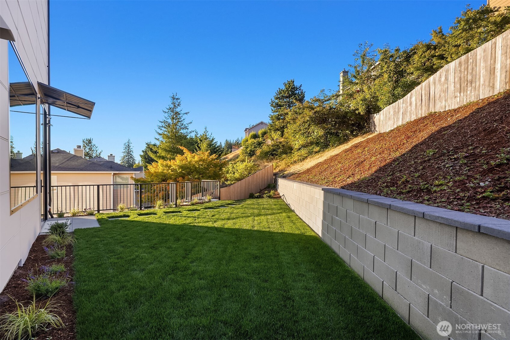 Private yard with covered patio area that has gas hookup for BBQ or fire pit!