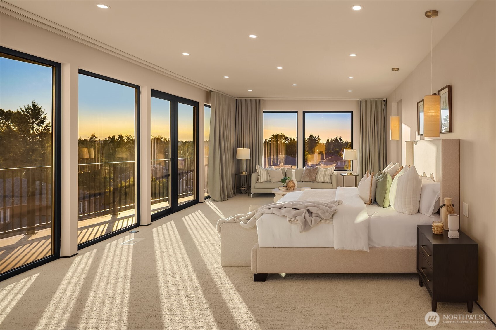Large primary bedroom with private deck + floor to ceiling windows!