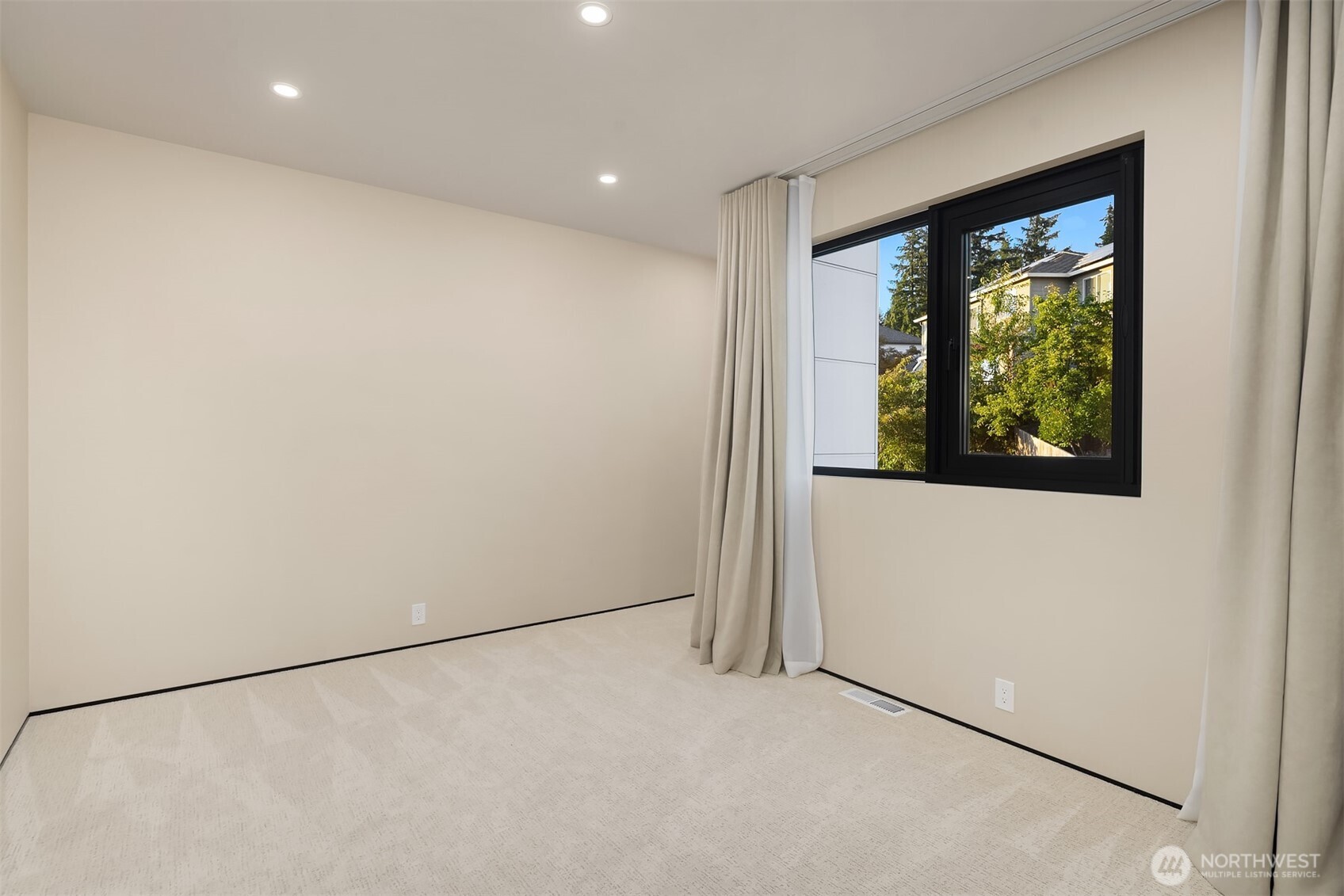 Another secondary bedroom with walk-in closet