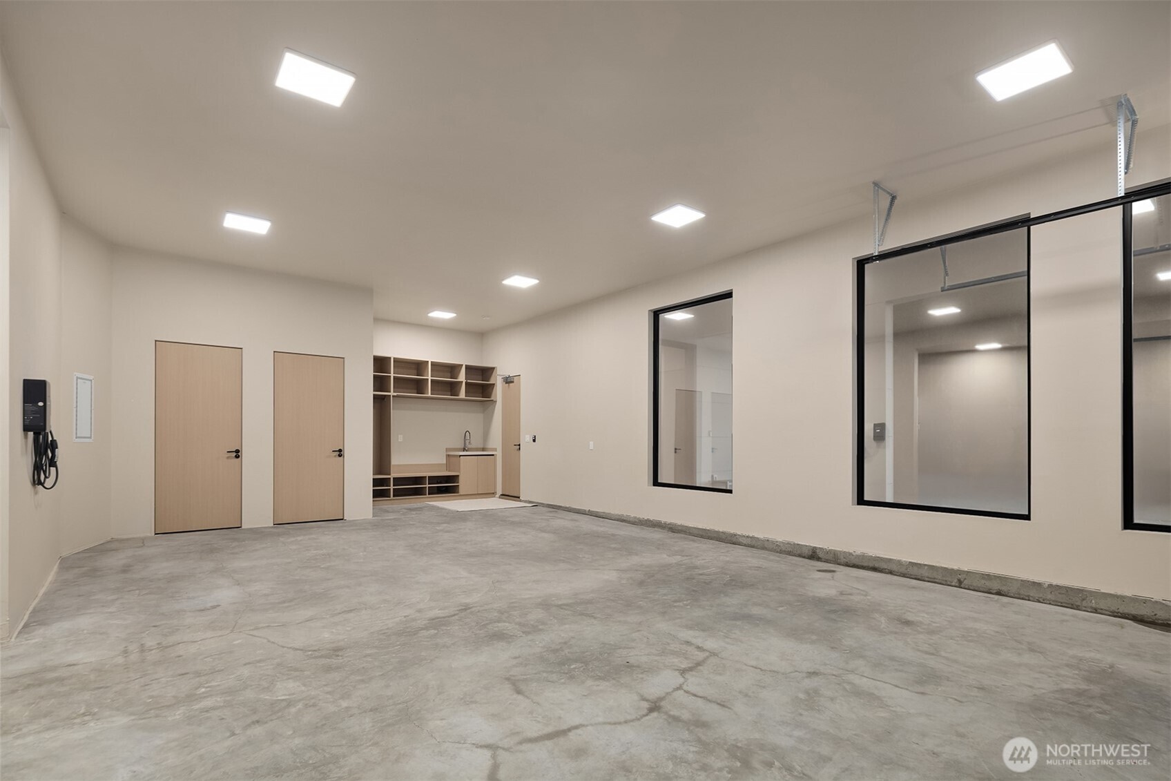 Tandem garage - fits 4 cars, mudroom, EV charger that is solar connected + dumbwaiter ready