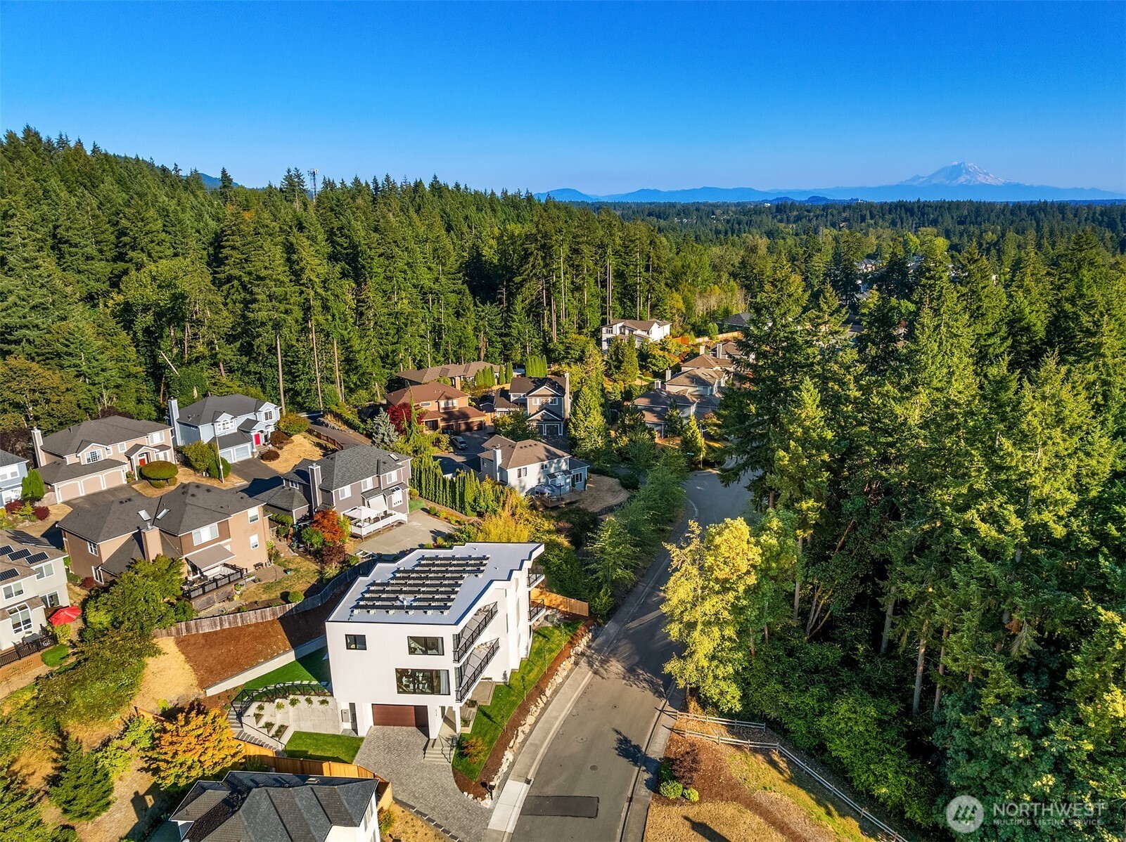 Situated in a quiet neighborhood. See Rainier in the distance?? Visible from the home's decks during a clear day!