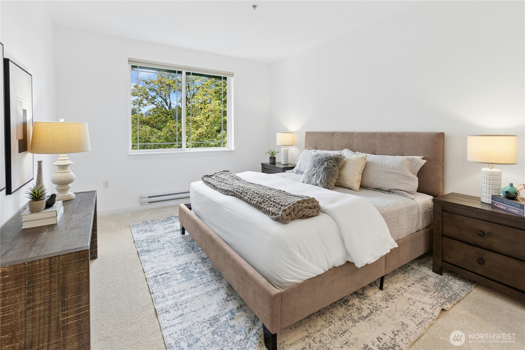 Spacious primary bedroom with peaceful views and room for a king-size bed