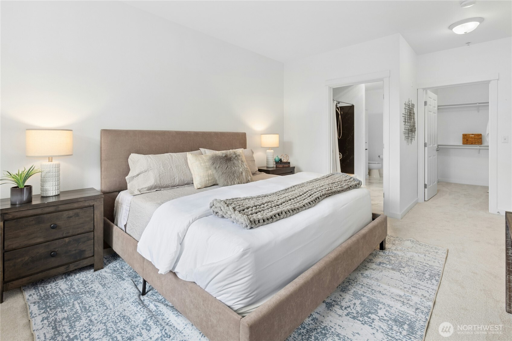 Light-filled primary suite offers comfort, privacy and generous proportions
