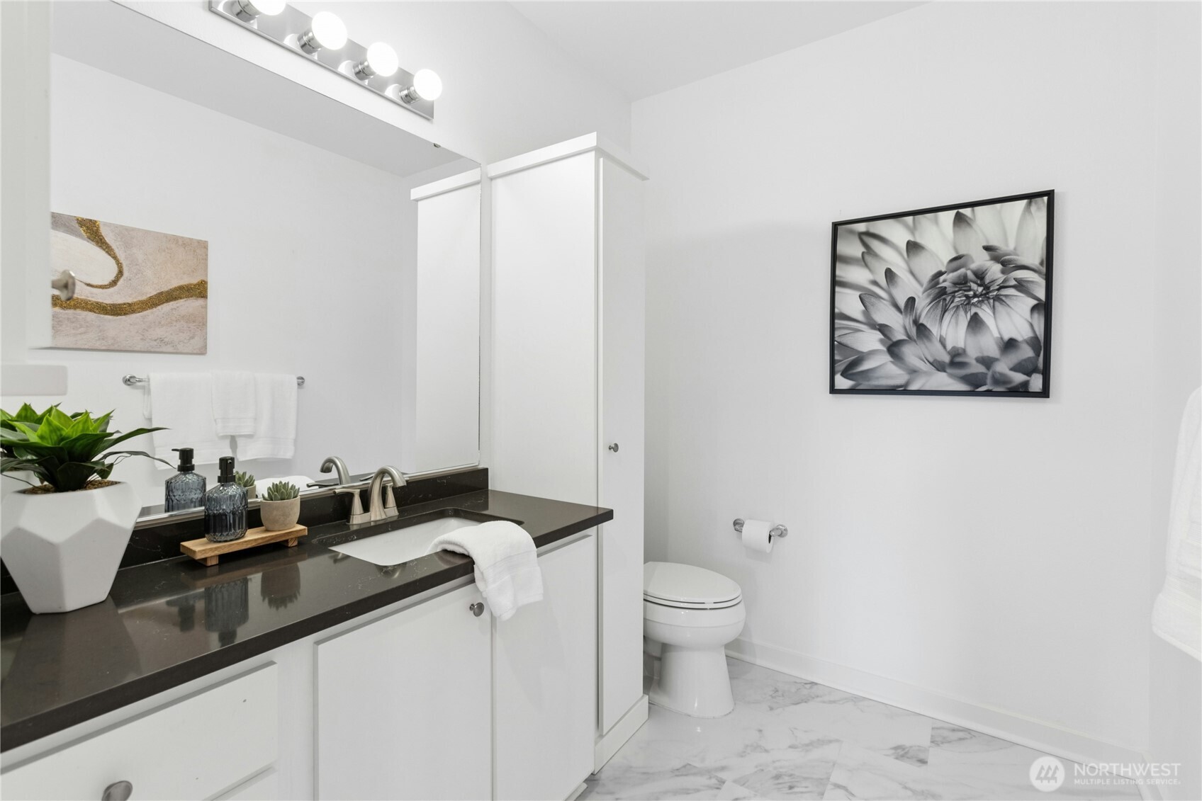 Primary bedroom features a private bath and walk-in closet.Updated!