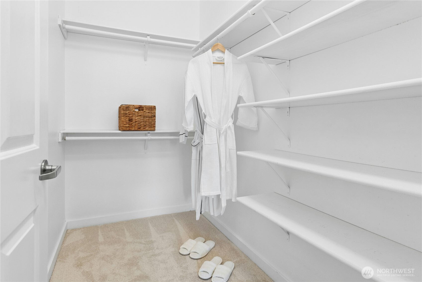 Primary bedroom features a private bath and walk-in closet