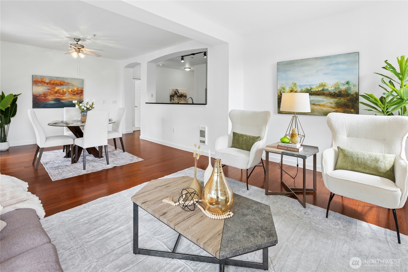 Inviting living room with cozy gas fireplace and abundant natural light