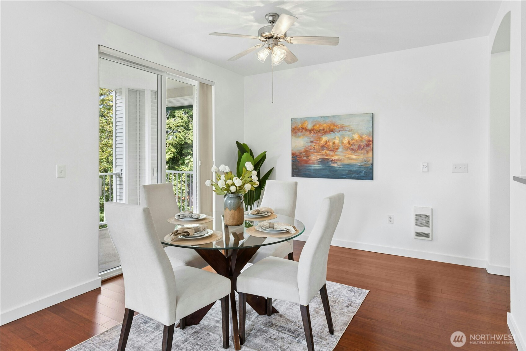 Spacious top-floor living area with fireplace and private wooded outlook